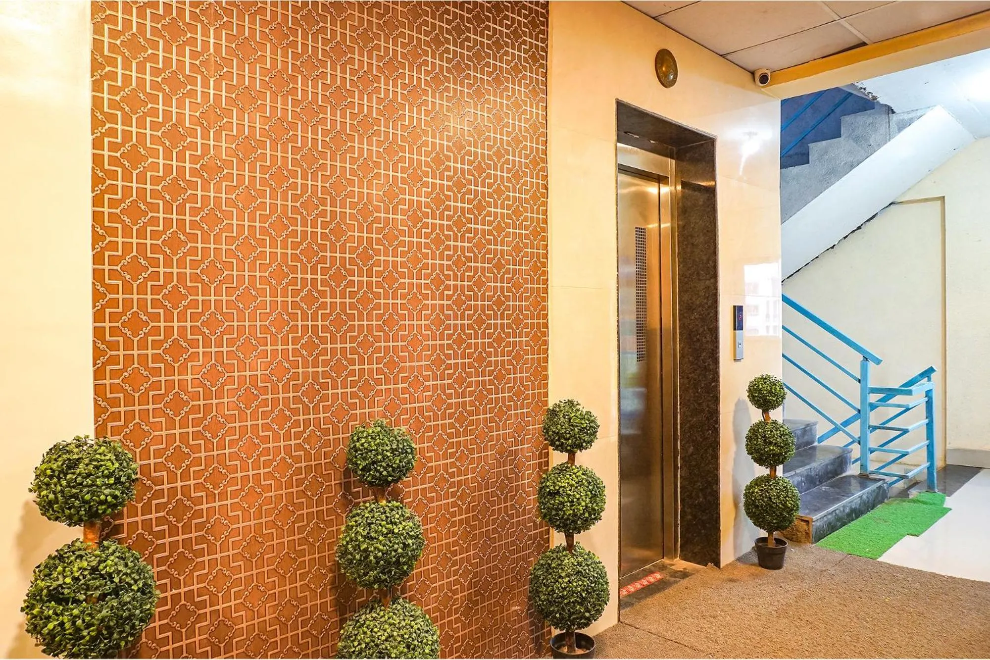 elevator in FabHotel Embassy near Amanora Mall