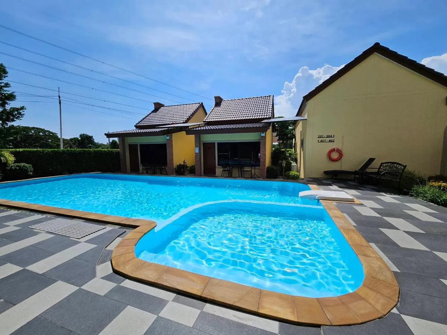 Swimming pool in CottagePine Rayong Resort&Cafe