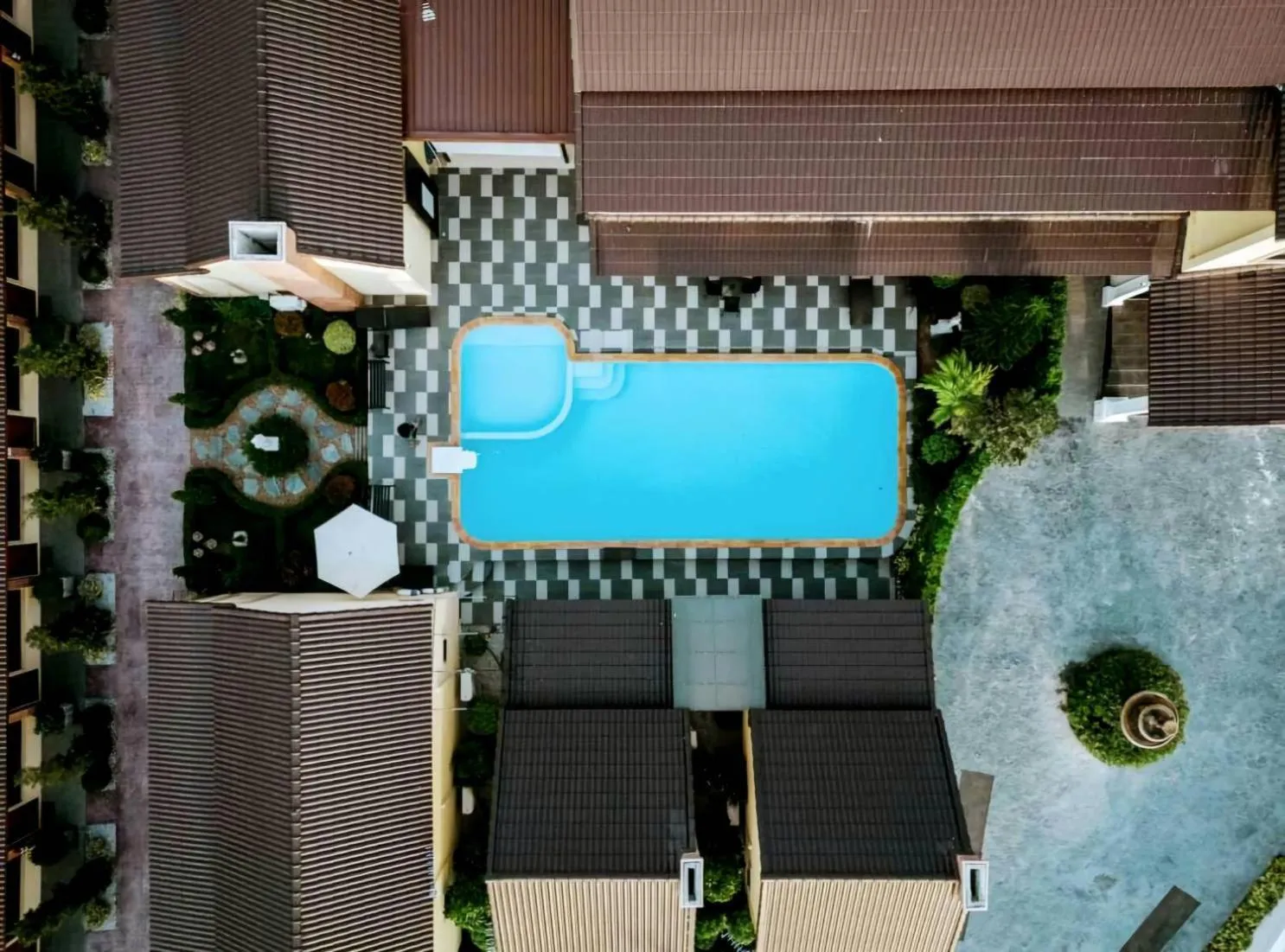 Swimming pool in CottagePine Rayong Resort&Cafe