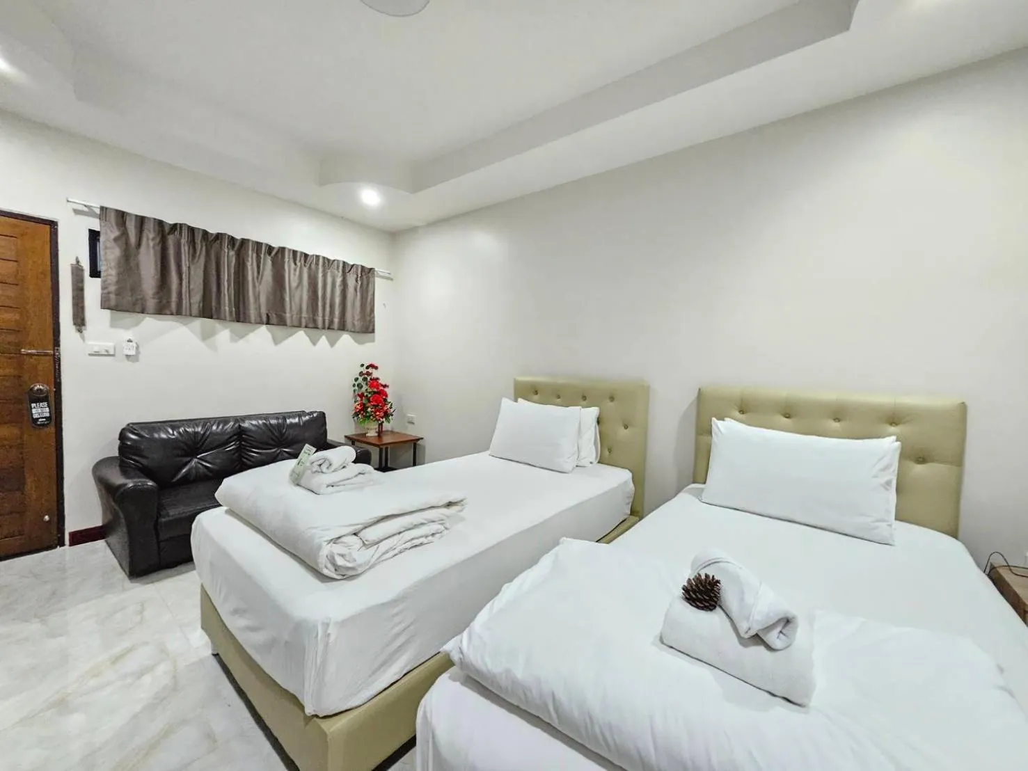 Bed in CottagePine Rayong Resort&Cafe