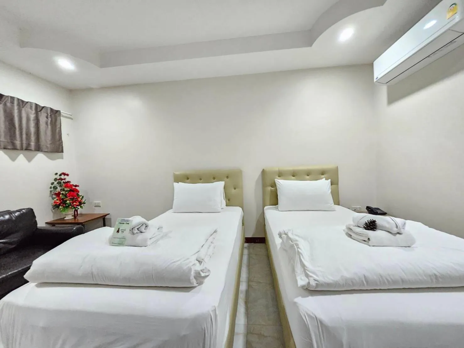 Bed in CottagePine Rayong Resort&Cafe