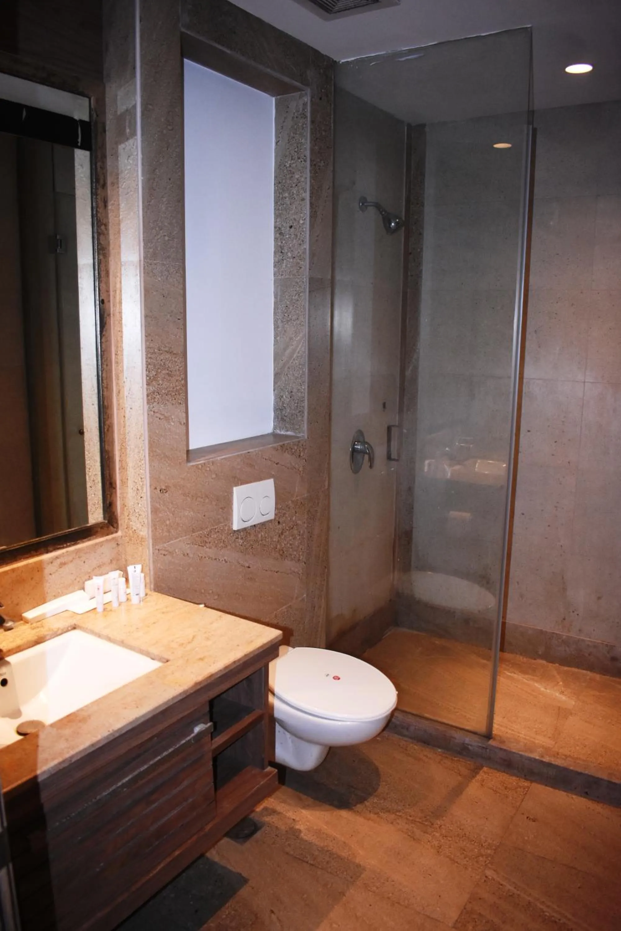 Bathroom in Lemonwood Suites by F9 Hotels - Trivoli Garden Chhatarpur