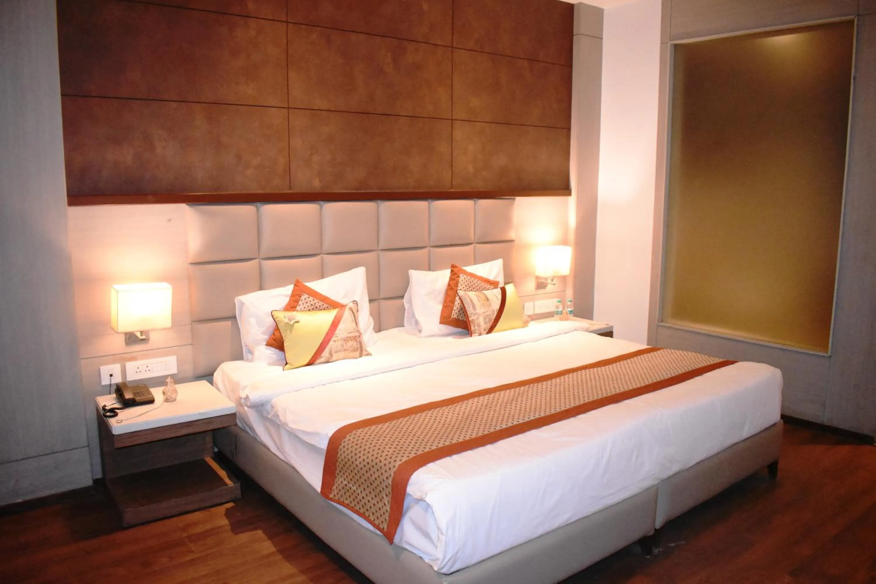 Bed in Lemonwood Suites by F9 Hotels - Trivoli Garden Chhatarpur