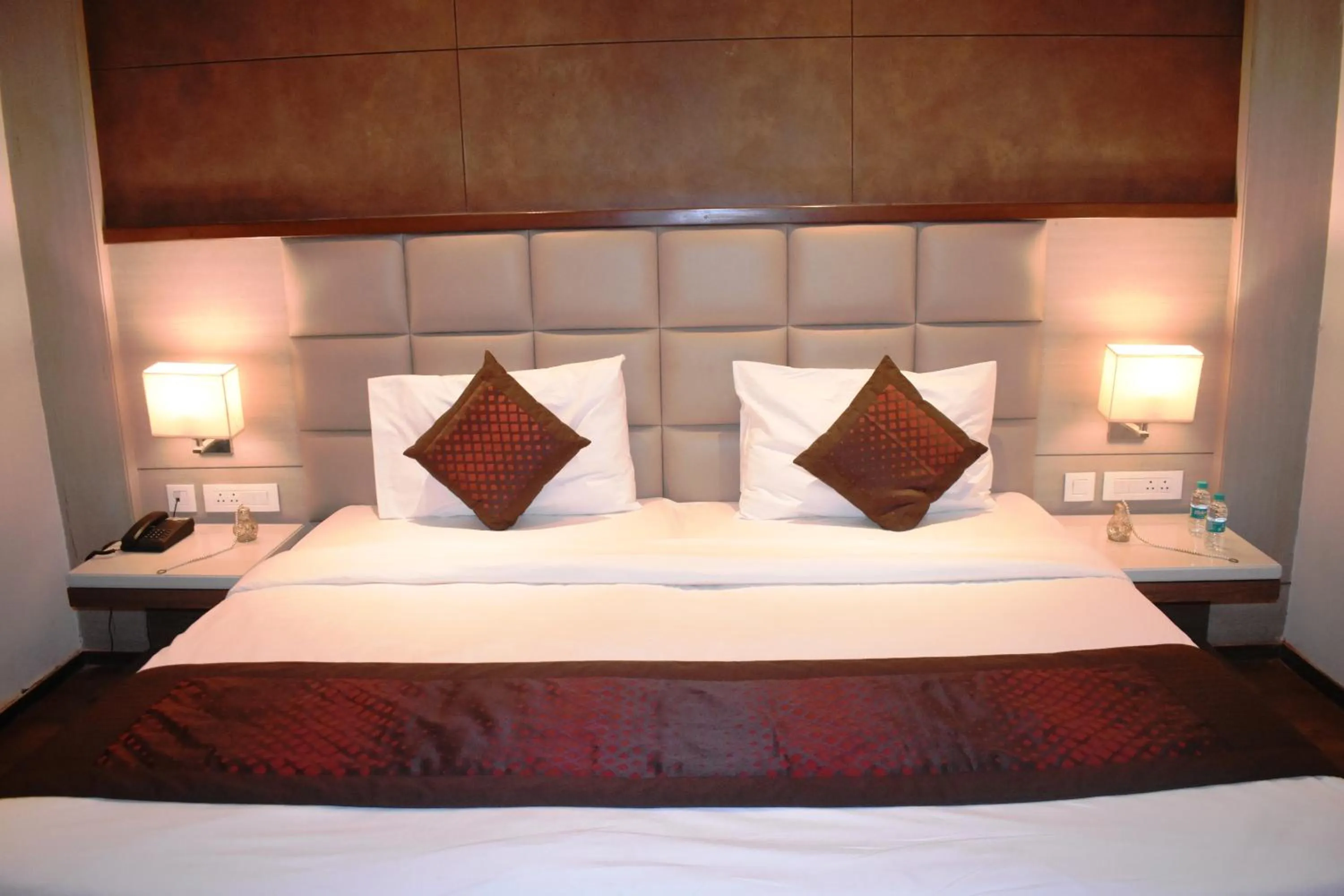 Bedroom, Bed in Lemonwood Suites by F9 Hotels - Trivoli Garden Chhatarpur