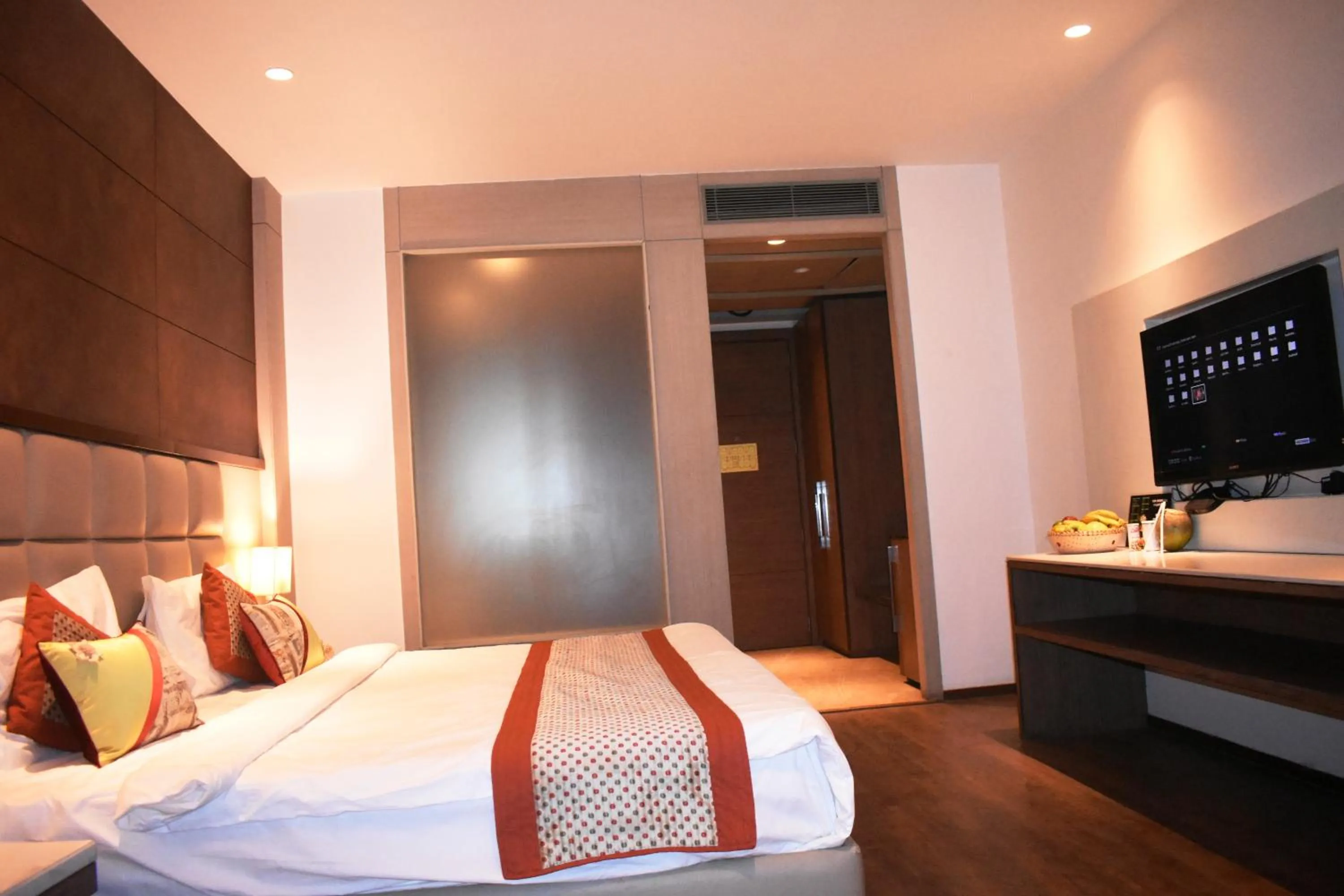 Bedroom, Bed in Lemonwood Suites by F9 Hotels - Trivoli Garden Chhatarpur