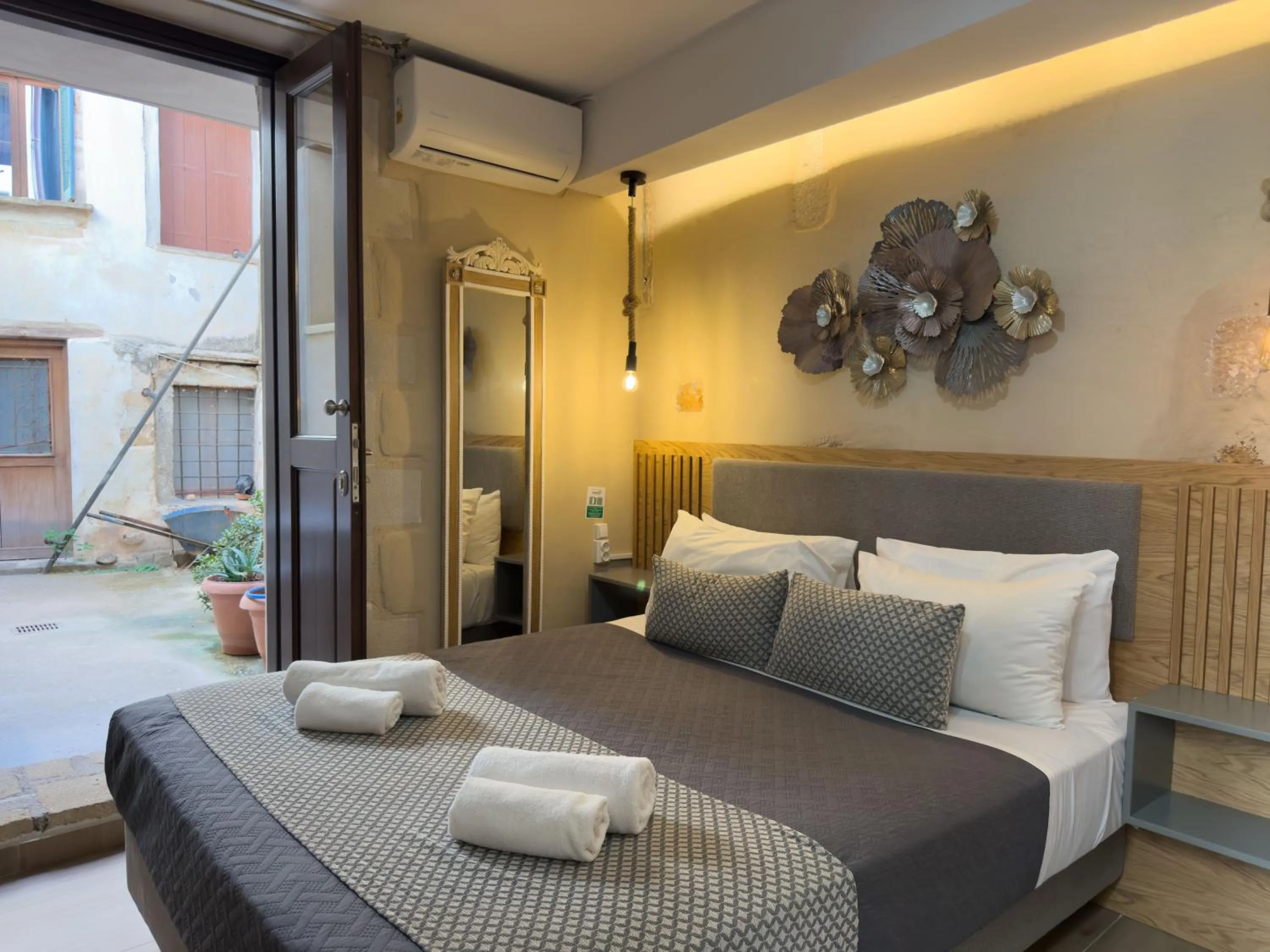 Bed in Bozzali Deluxe Hotel