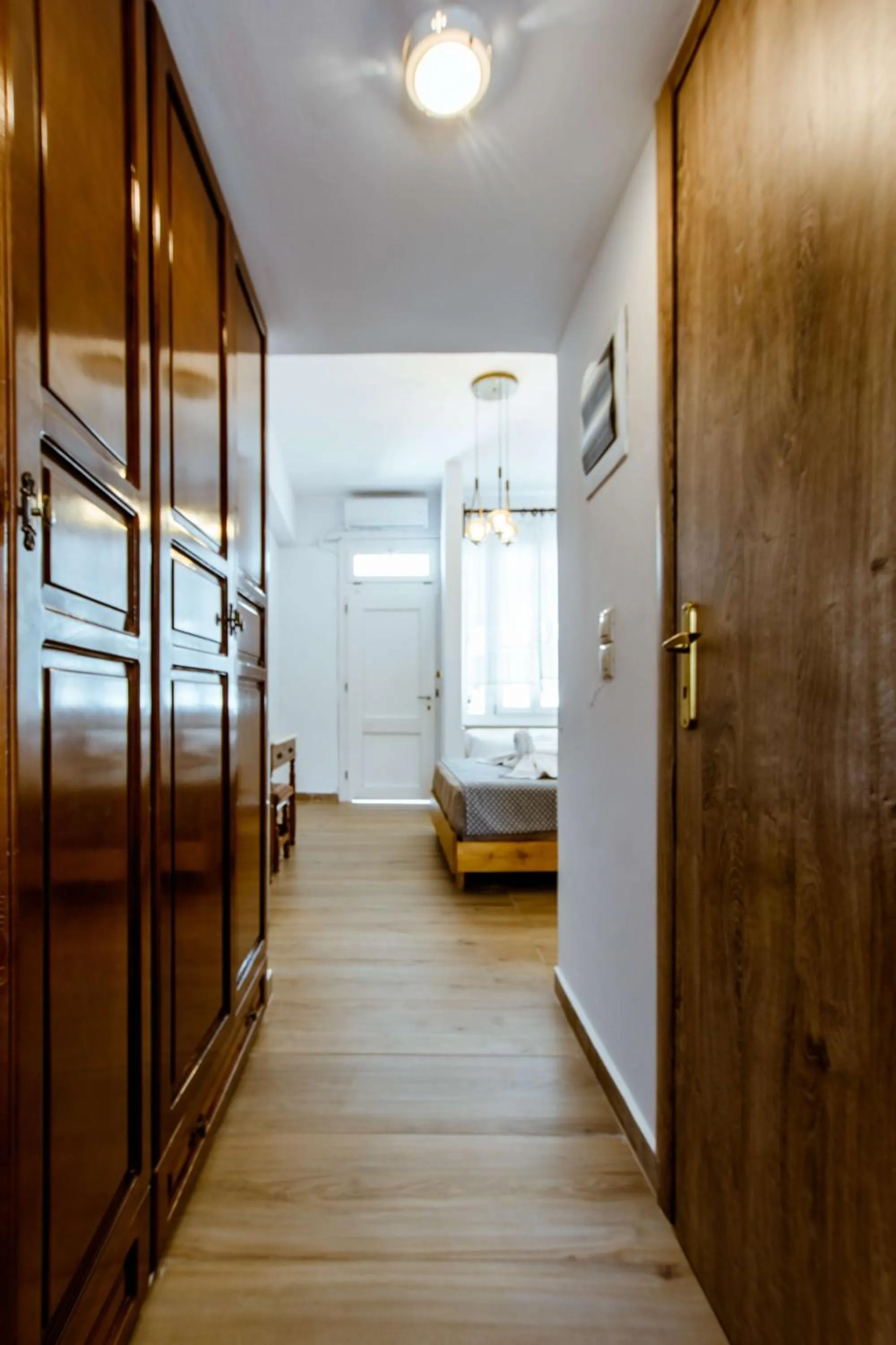 wardrobe, Bed in Bozzali Deluxe Hotel