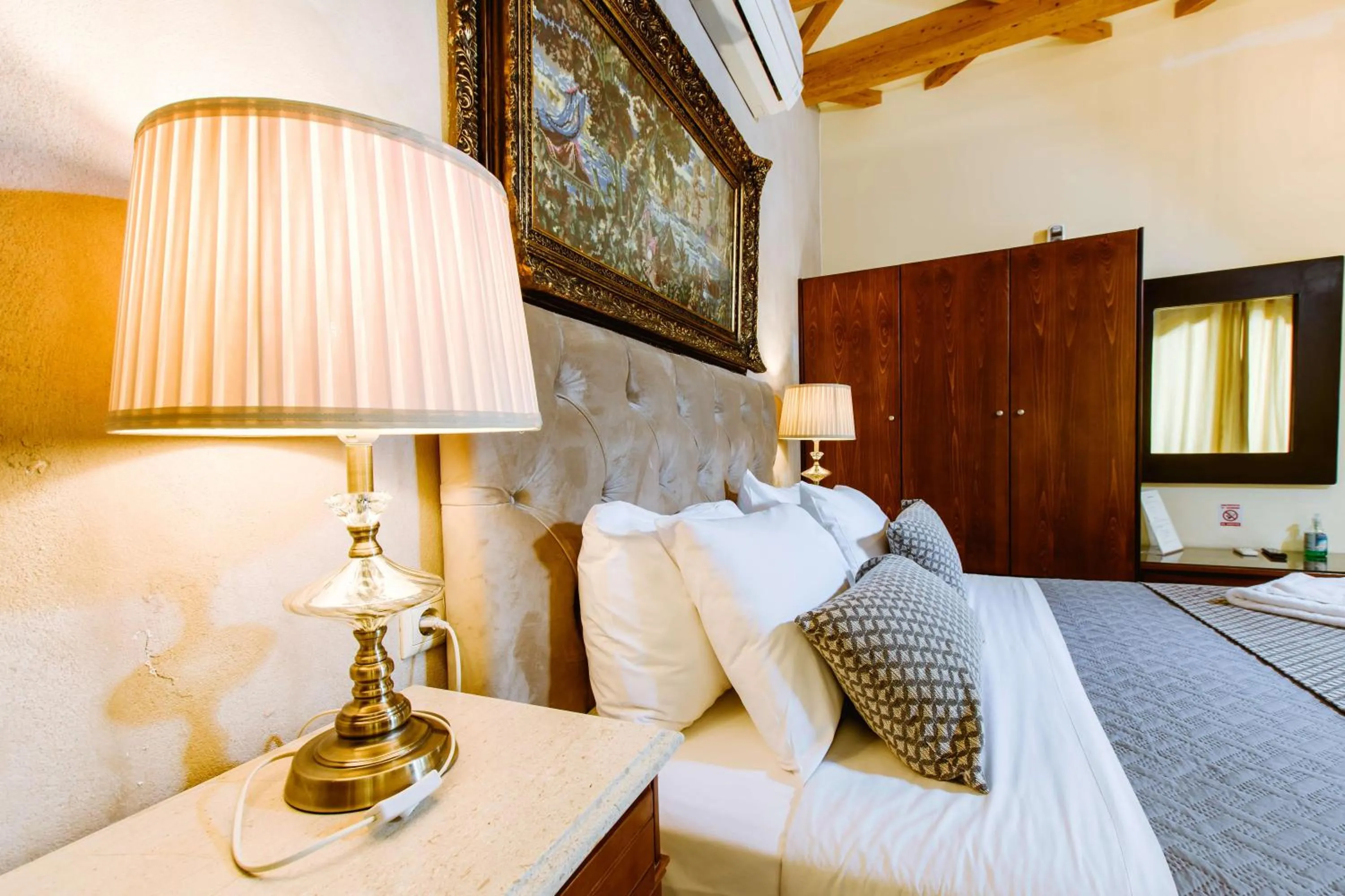 Bed in Bozzali Deluxe Hotel