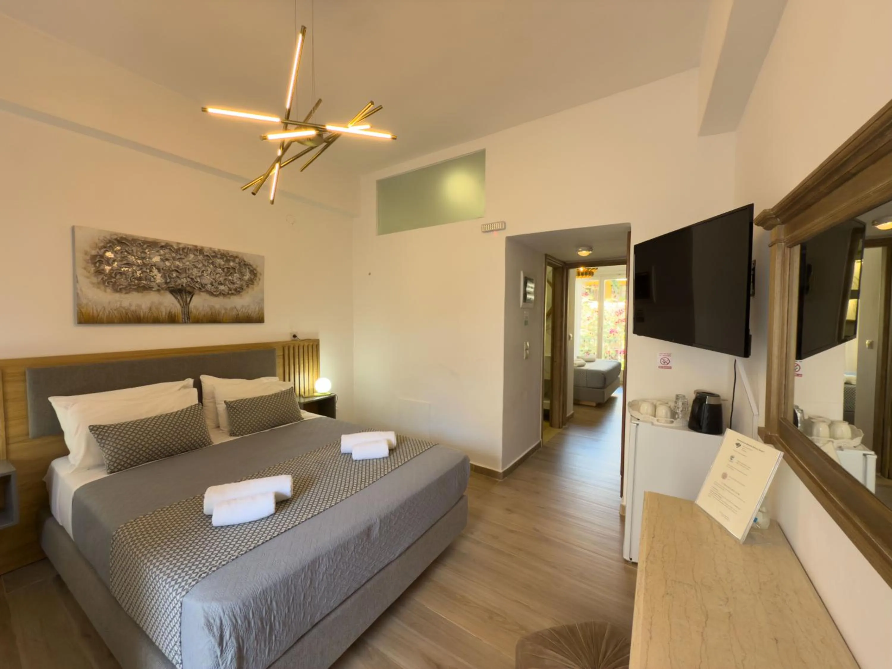 Photo of the whole room, Bed in Bozzali Deluxe Hotel