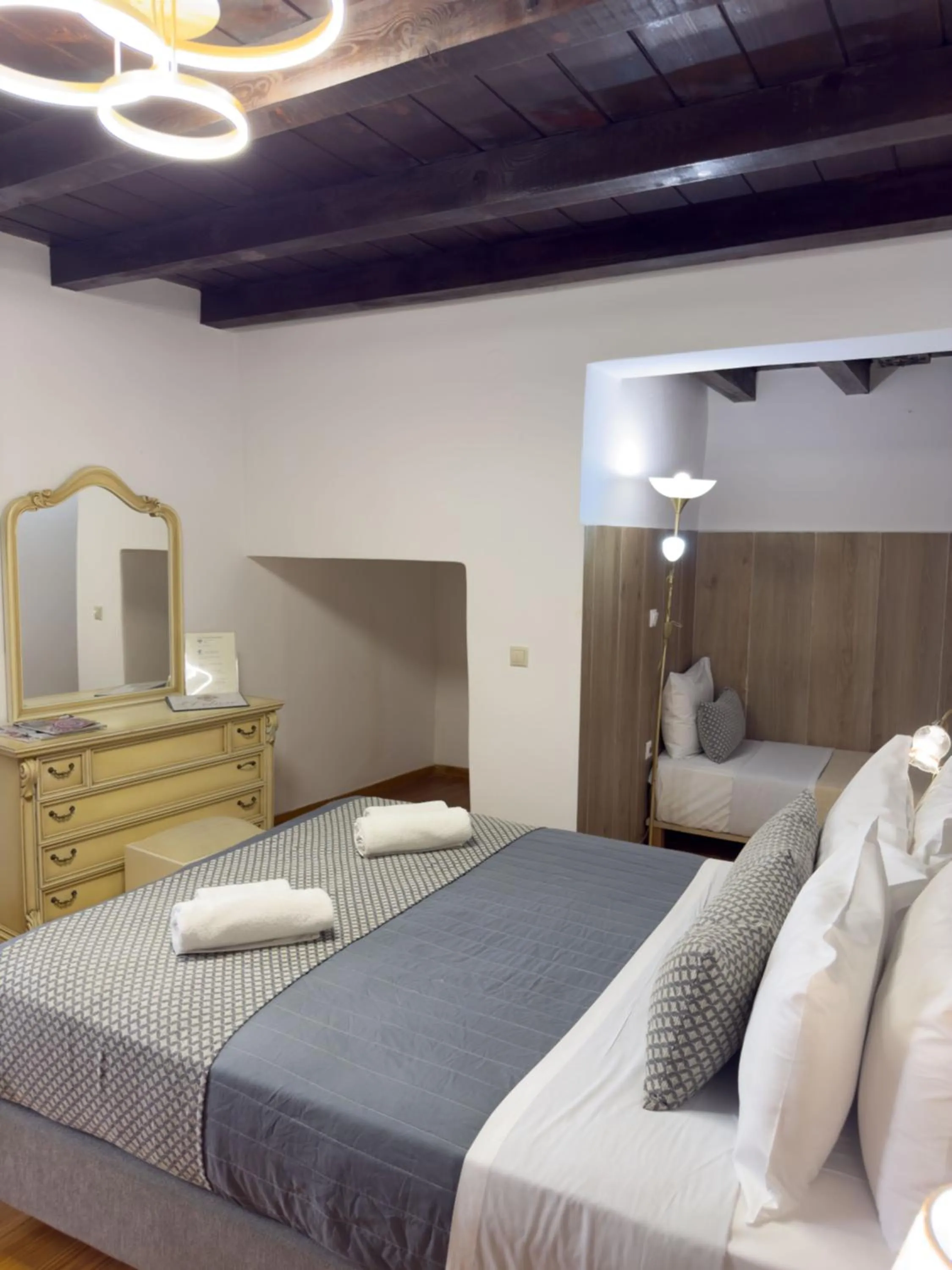 Bed in Bozzali Deluxe Hotel