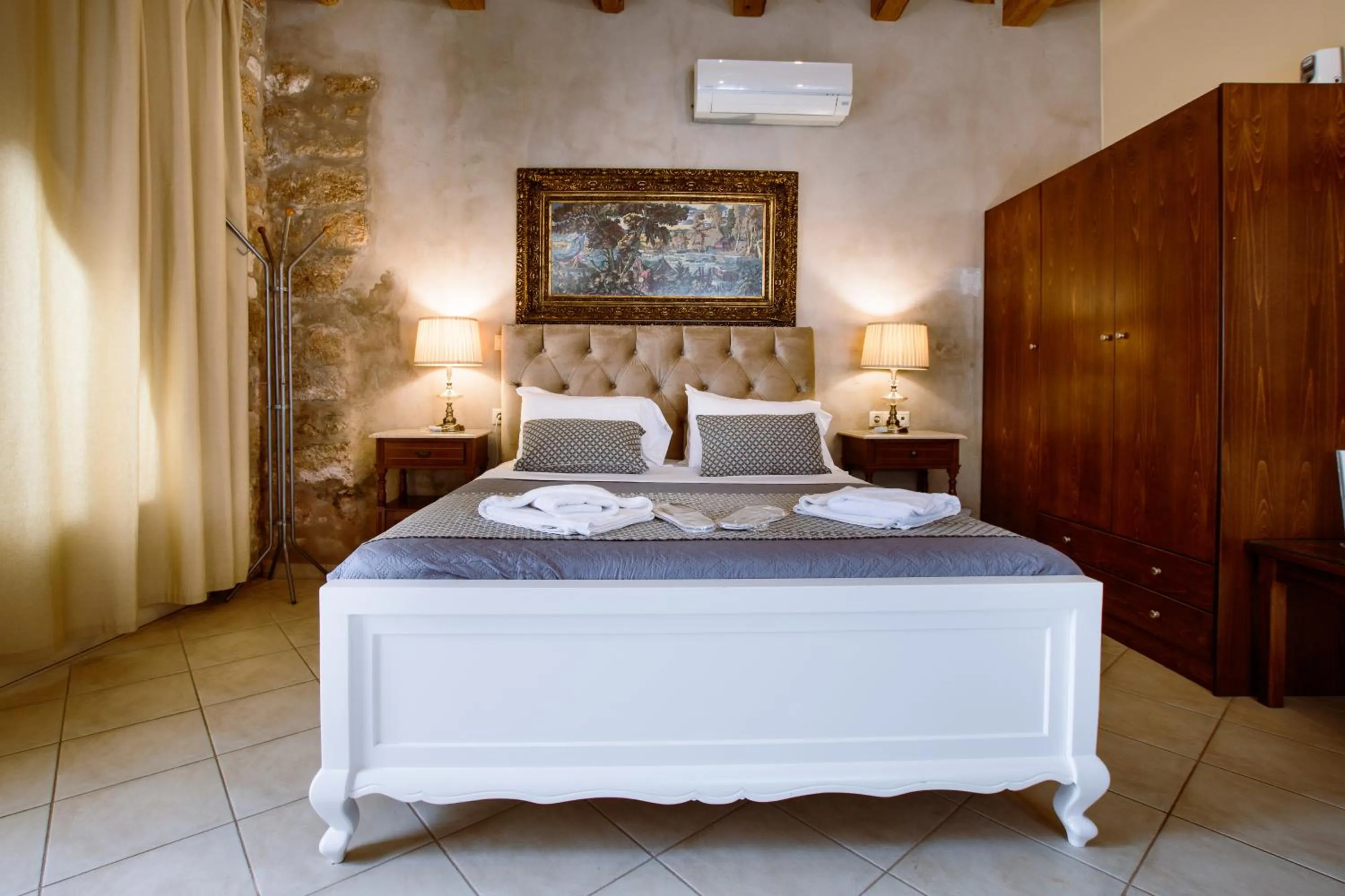 Bed in Bozzali Deluxe Hotel