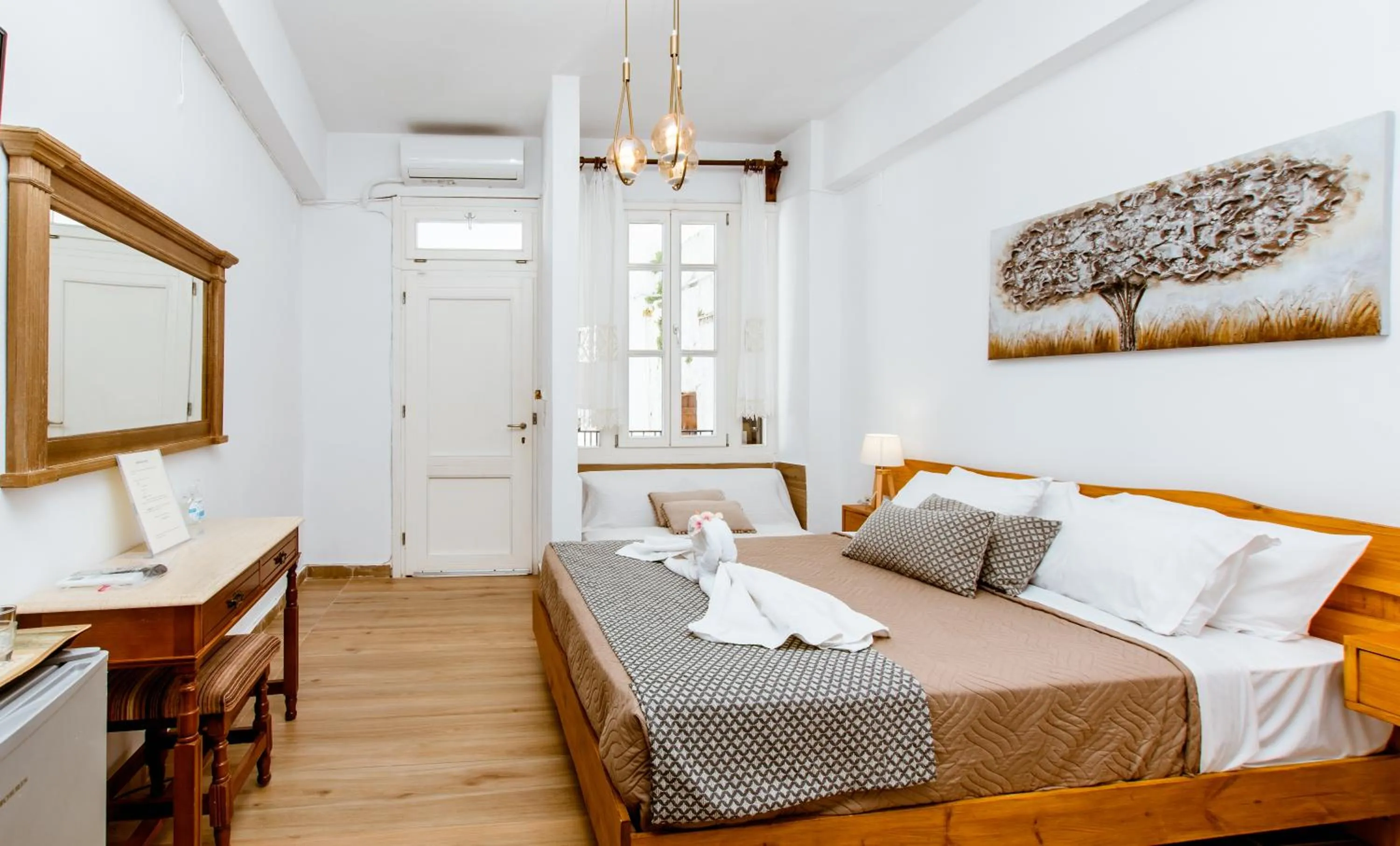 Bed in Bozzali Deluxe Hotel