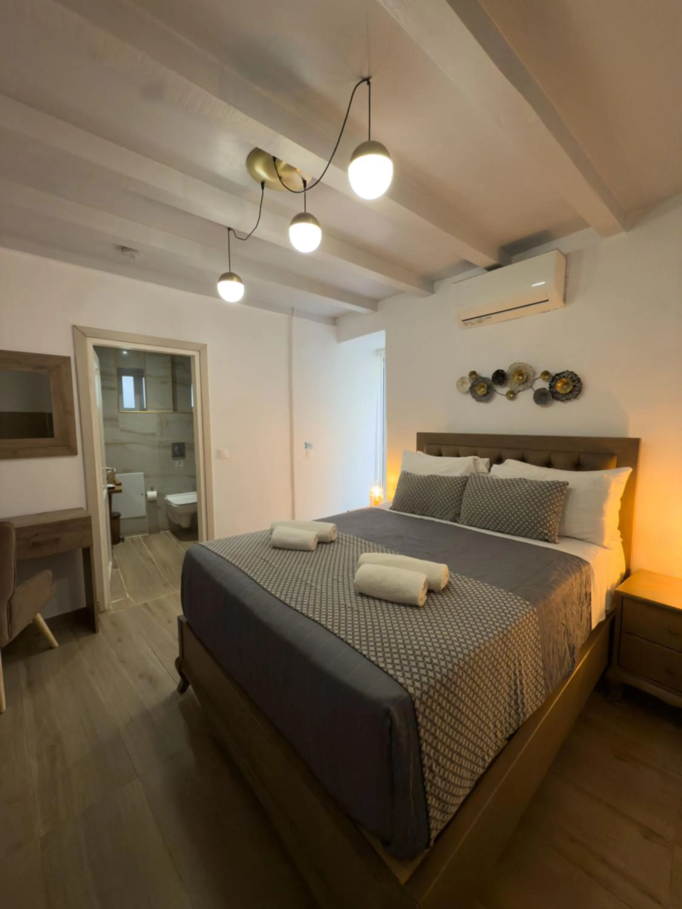 Bed in Bozzali Deluxe Hotel