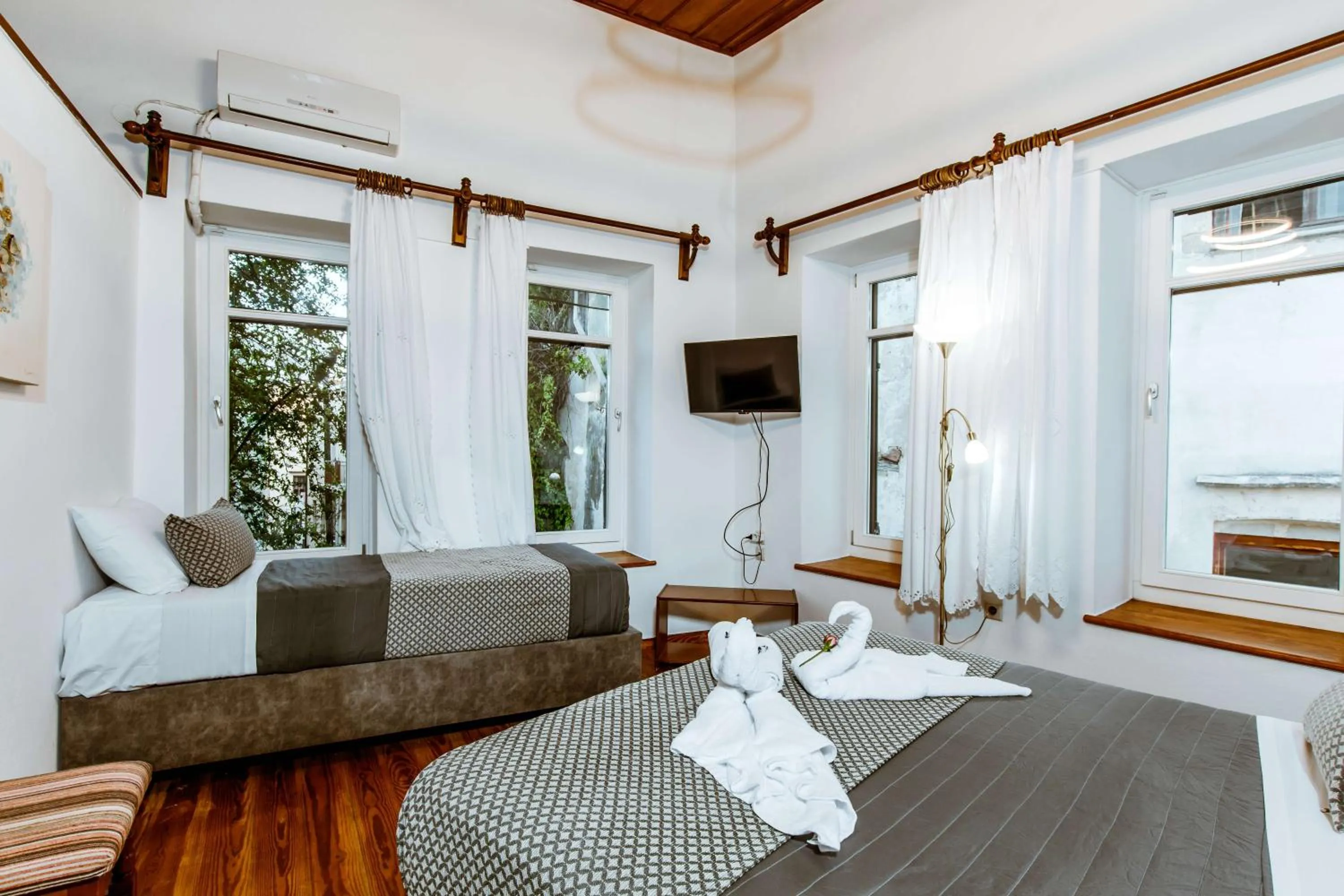 Bed in Bozzali Deluxe Hotel