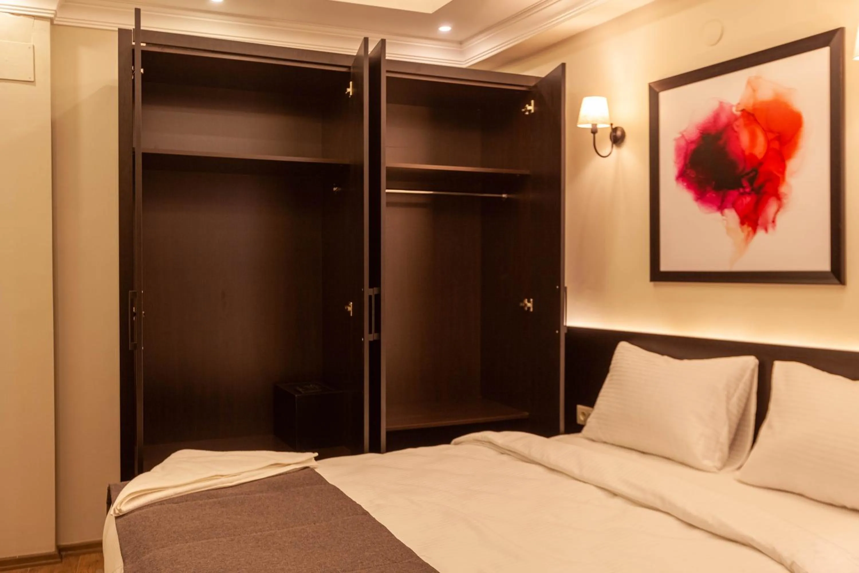 Bed in Lilium Luxury Suites
