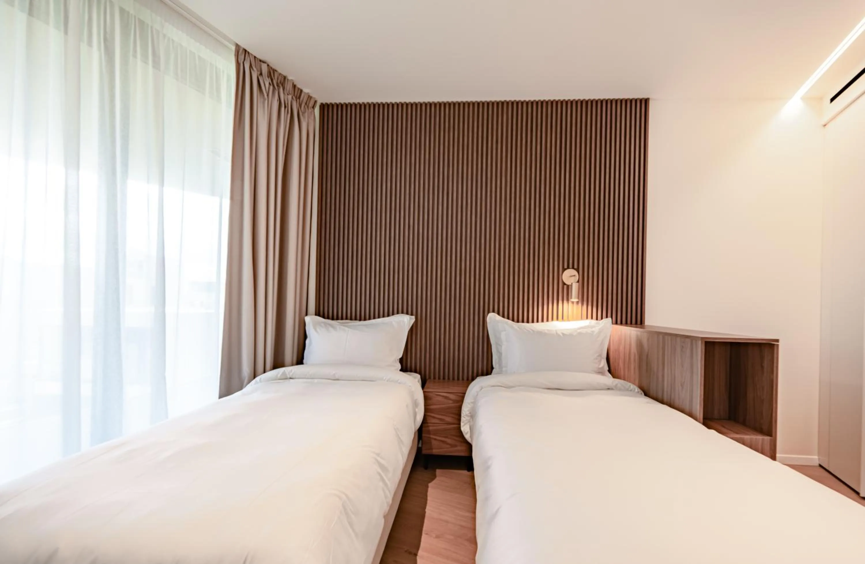 Bed in Petram Resort & Residences