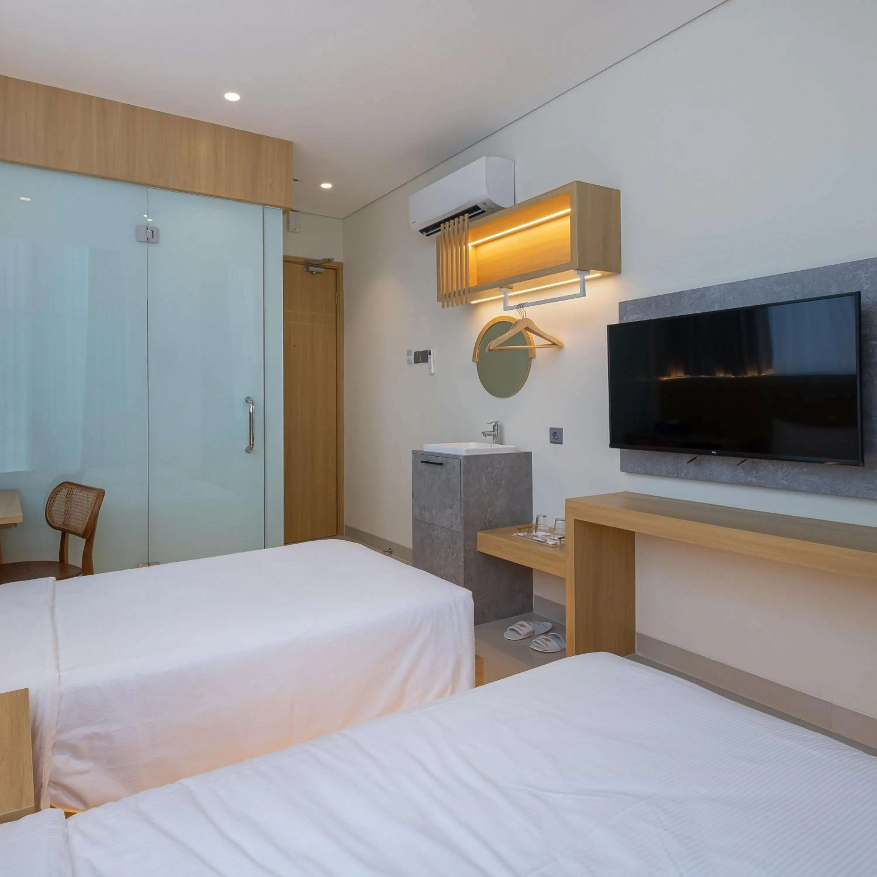 Bed in The Risman Hotel At Jakarta Airport CBC