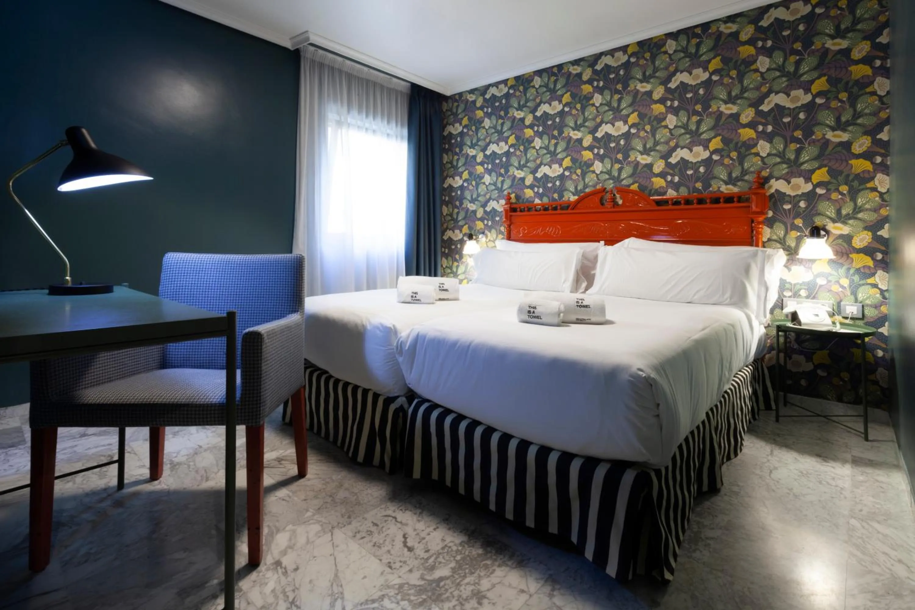 Bed in Petit Palace Puerta de Triana