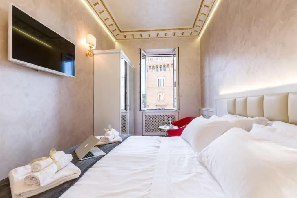 Bed in Piazza Venezia Luxury Suite