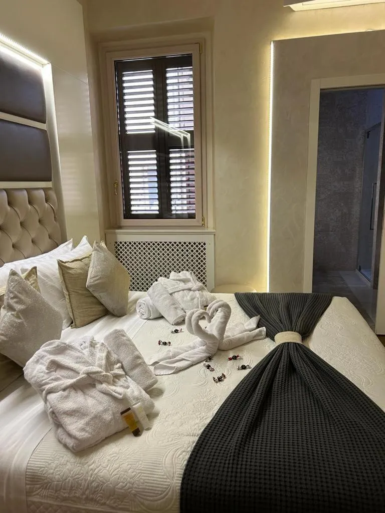 Bed in Piazza Venezia Luxury Suite