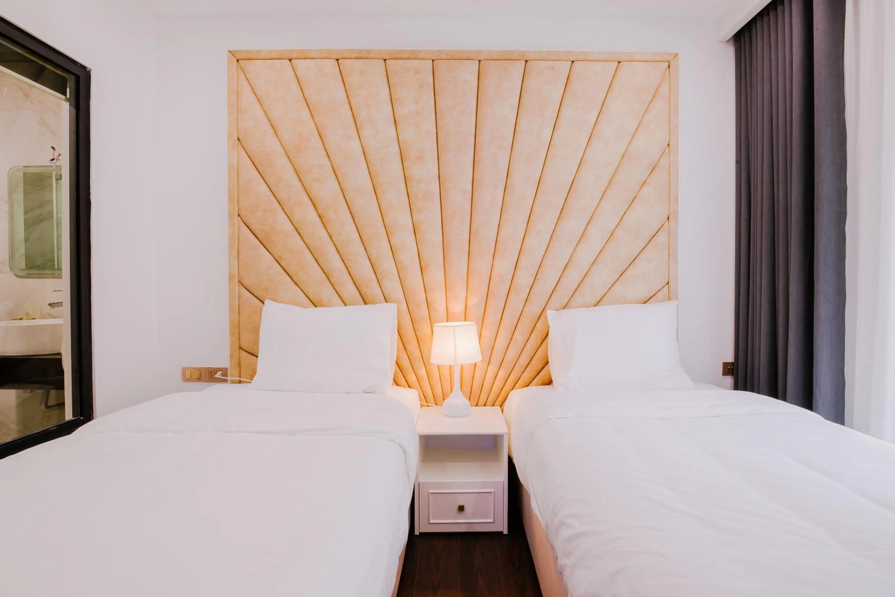 Bed in Royal Lotus Hotel