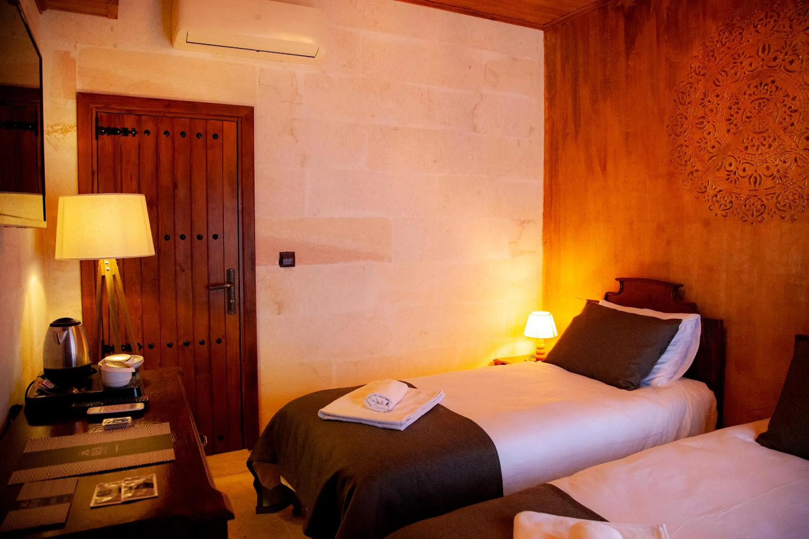 Bed in Reji Boutique Hotel