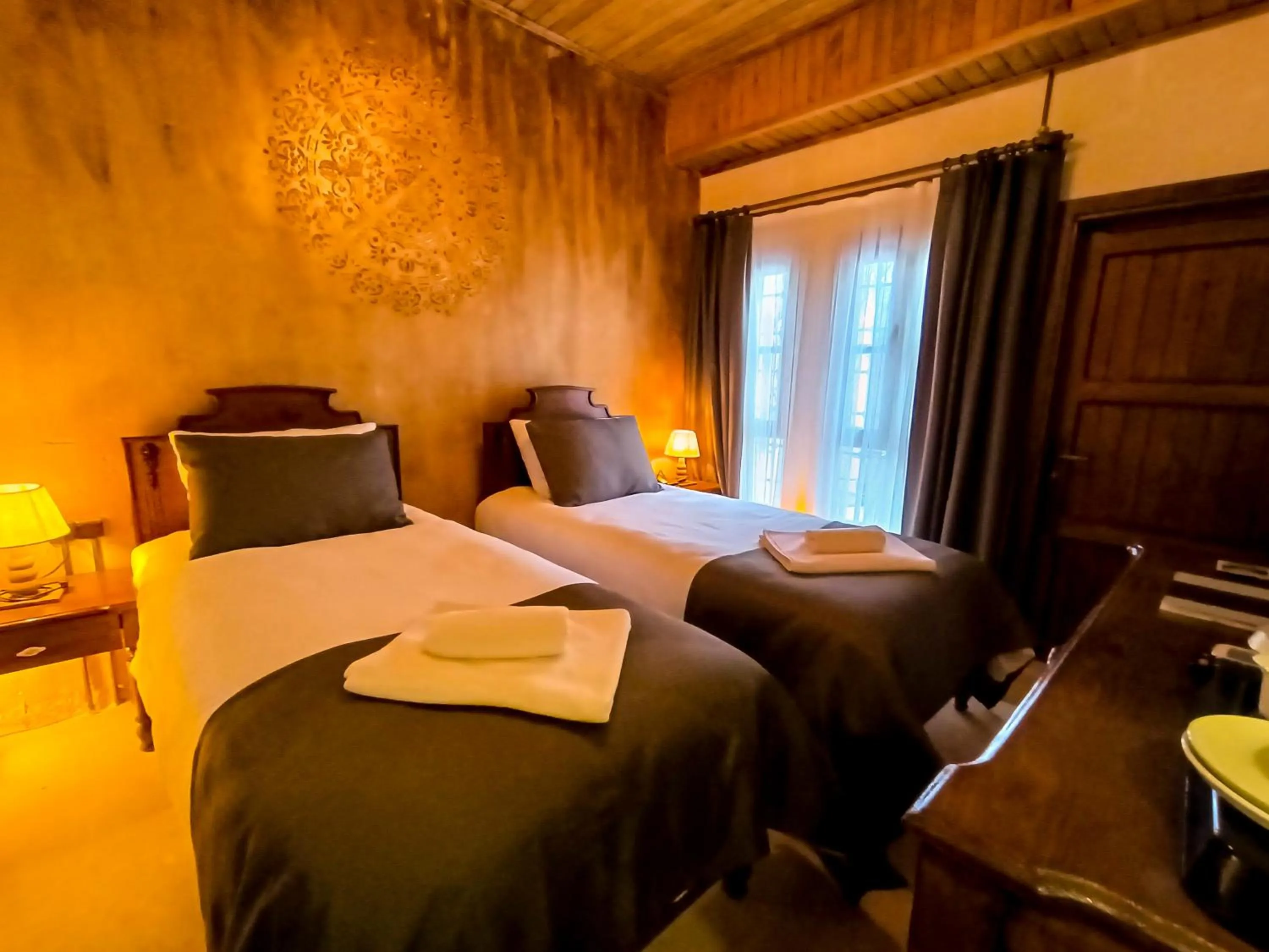 Bed in Reji Boutique Hotel