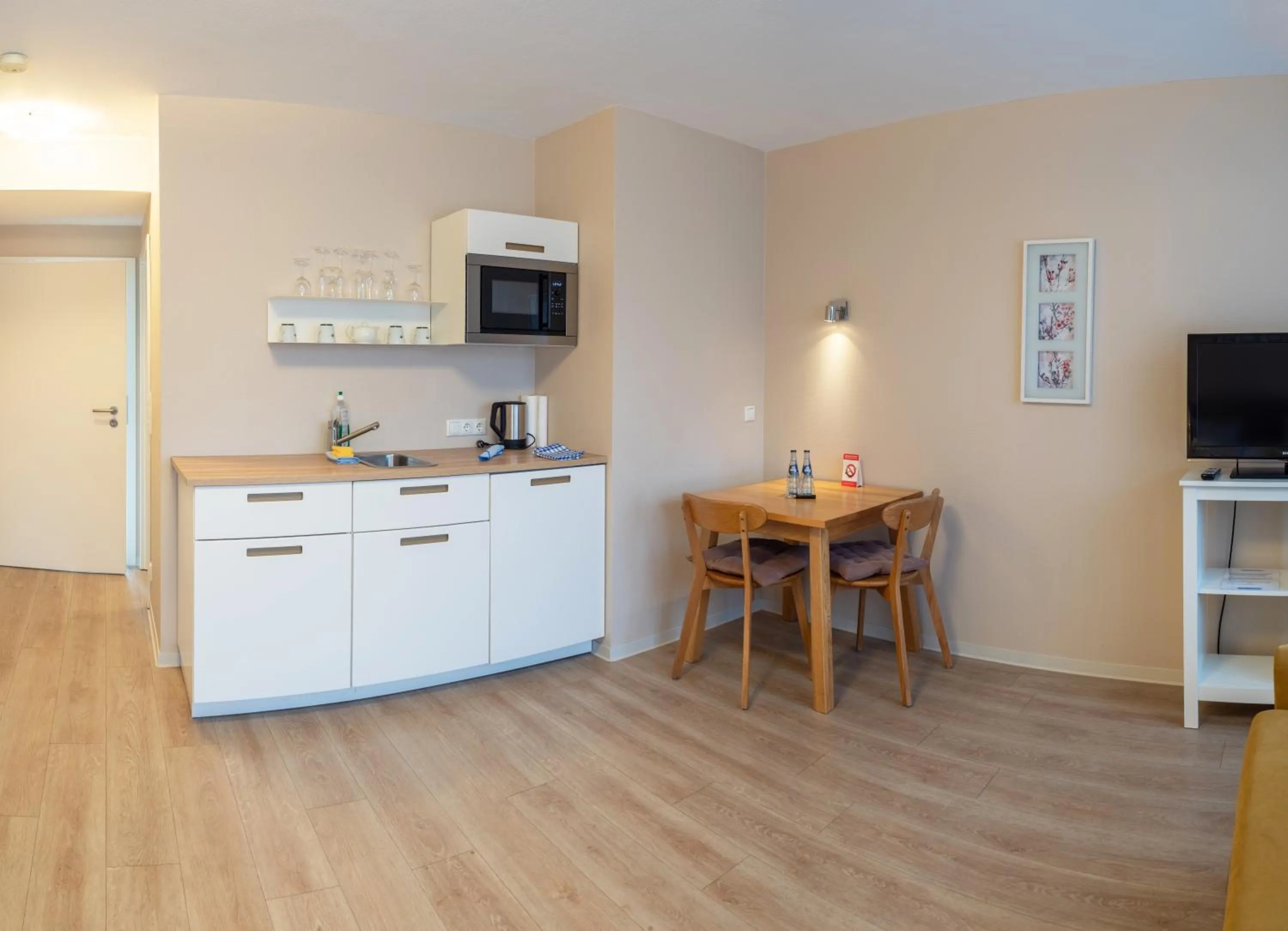 Kitchen or kitchenette in Lieblingsplatz Hotel Seedeich