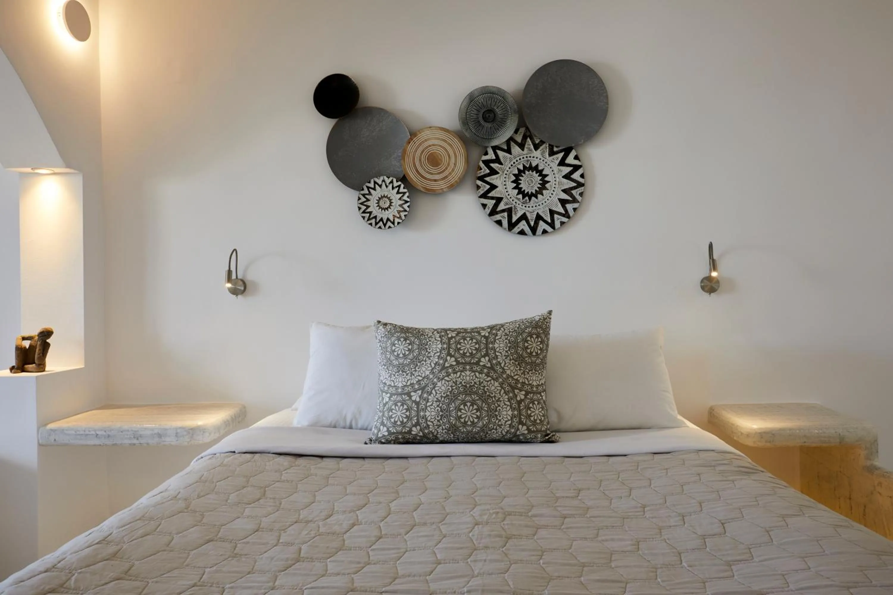 Bed in Suites of the Gods Cave Spa Hotel