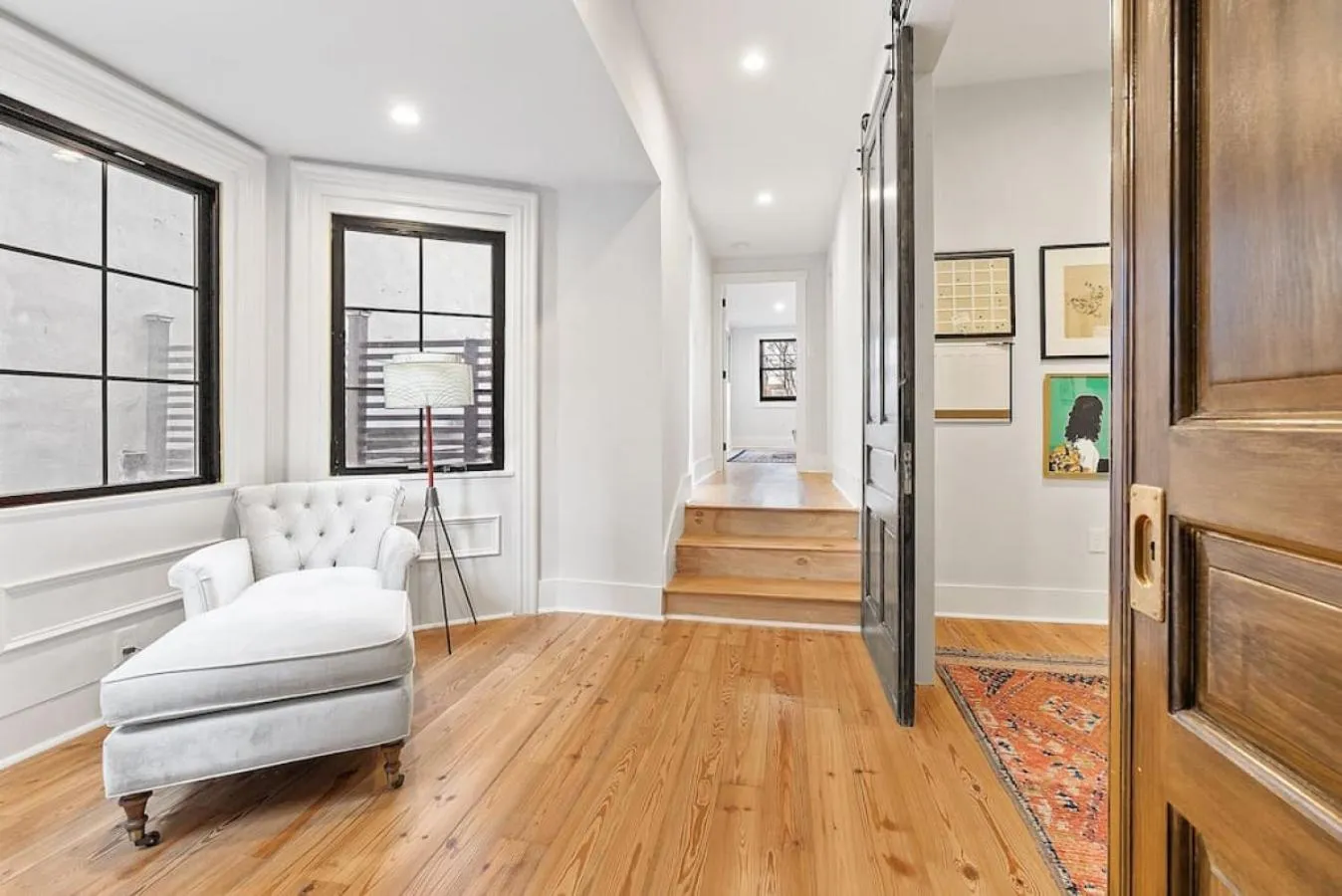 Seating area, Bed in Designer 3 BR Townhome with Beautiful Backyard