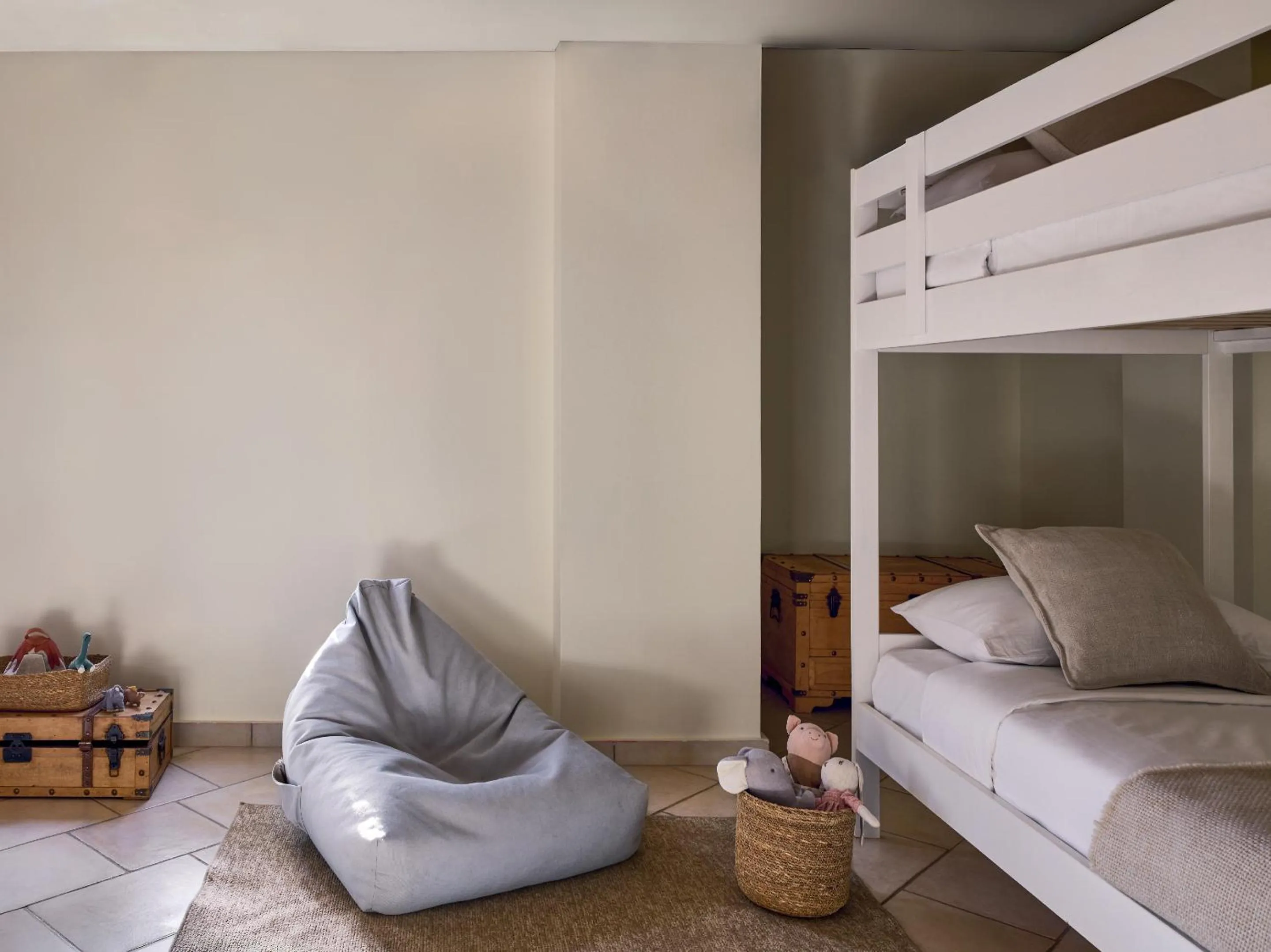 Bed in Grecotel Plaza Beach House