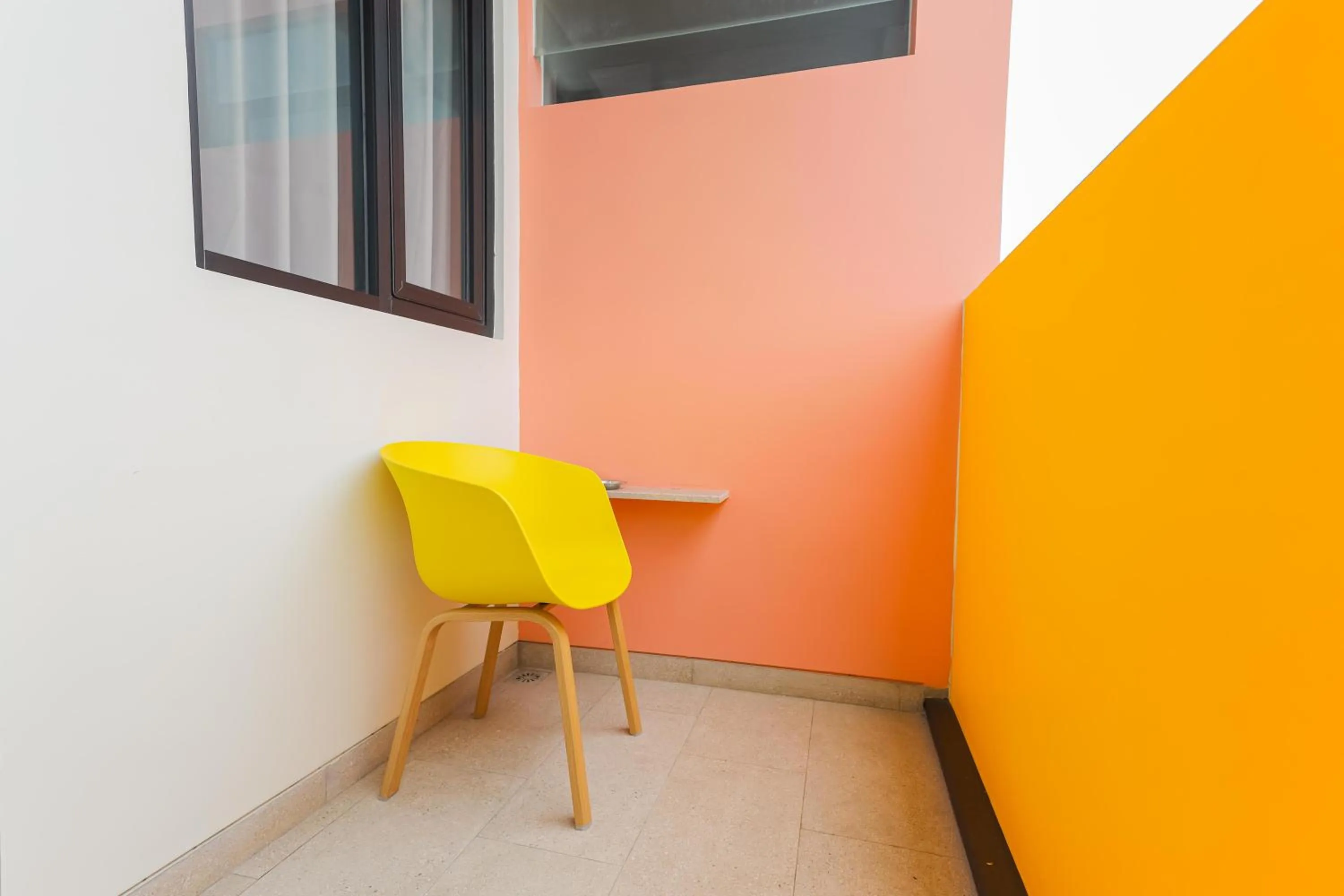 Balcony/Terrace in Sans Hotel Clover Ace Surabaya by RedDoorz