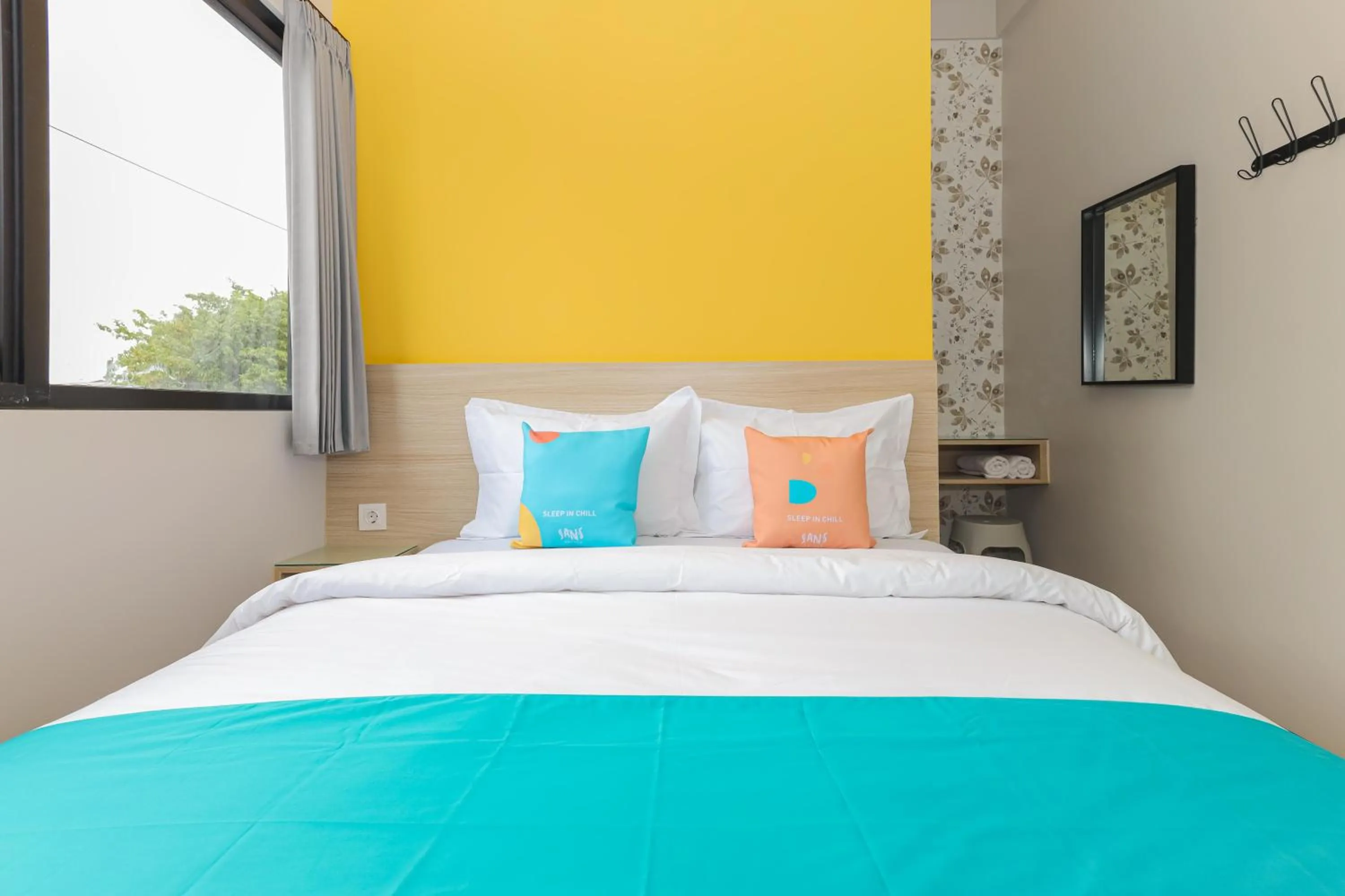 Bedroom, Bed in Sans Hotel Clover Ace Surabaya by RedDoorz