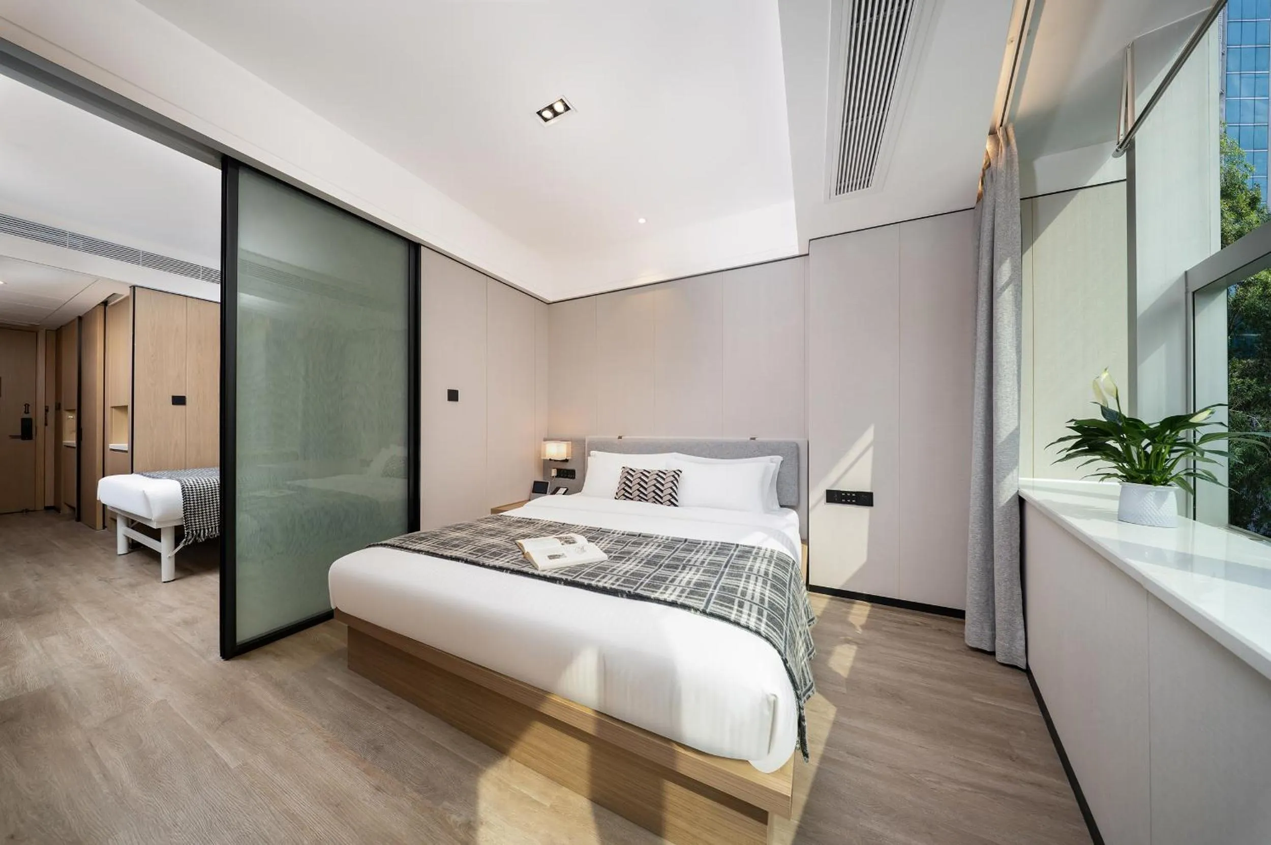 Bed in CM Serviced Apartment Shenzhen Dongmen