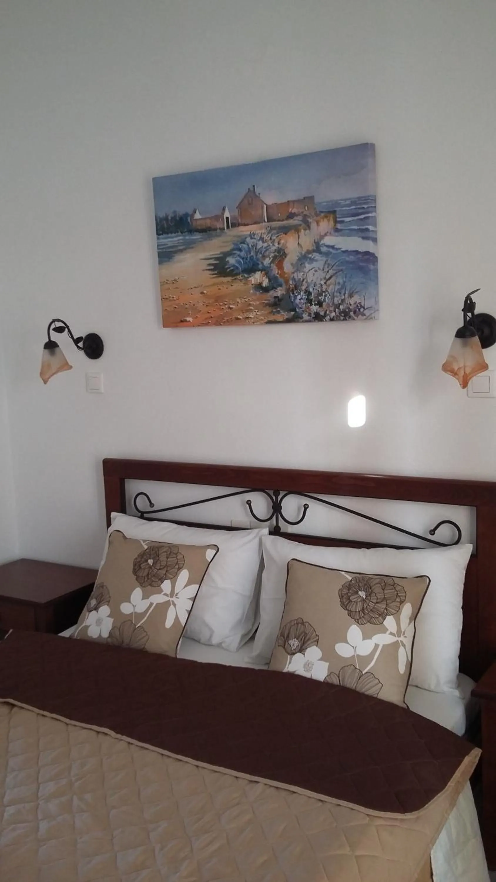 Bed in Rita's Place Hotel