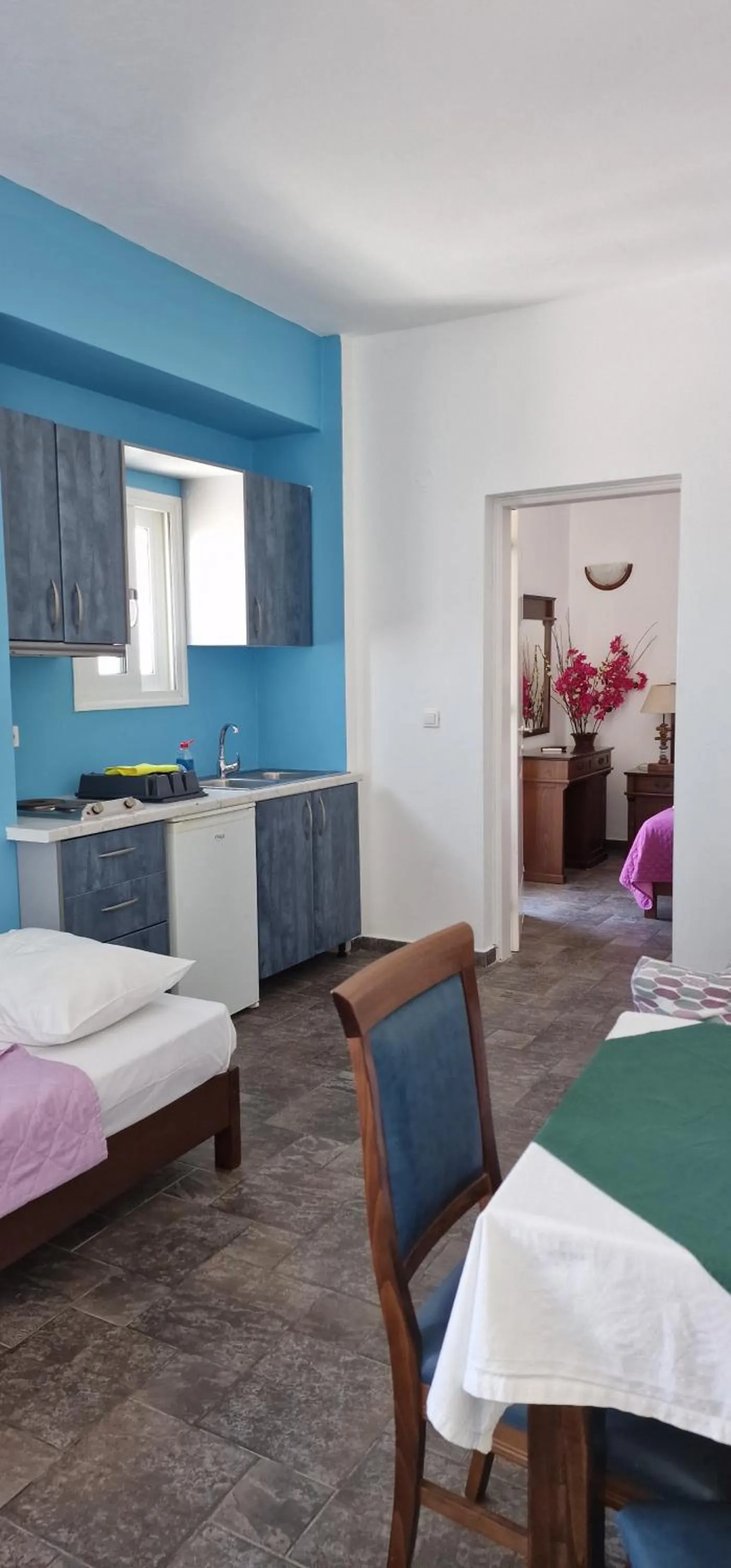 Bed in Rita's Place Hotel