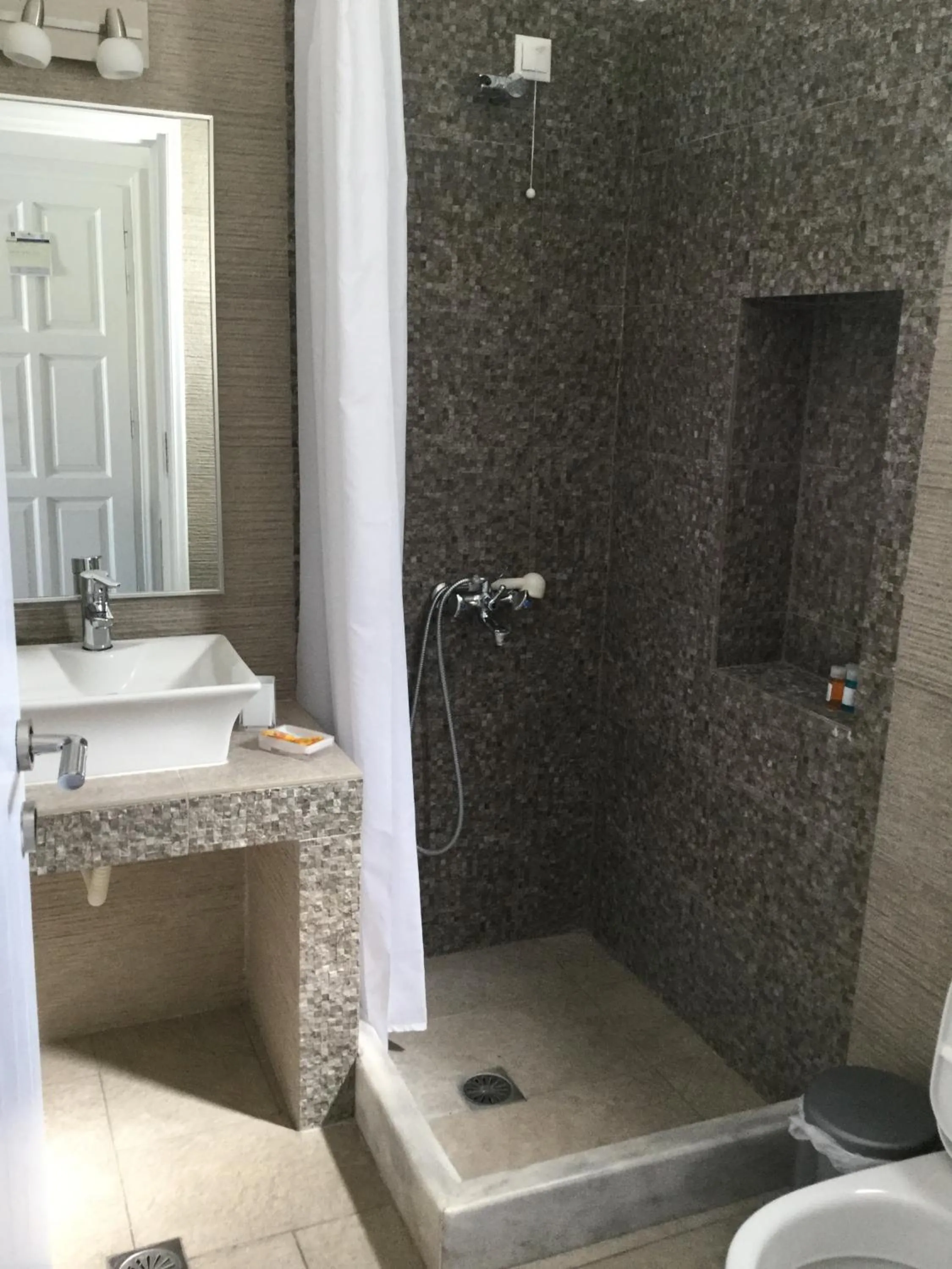 Bathroom in Rita's Place Hotel