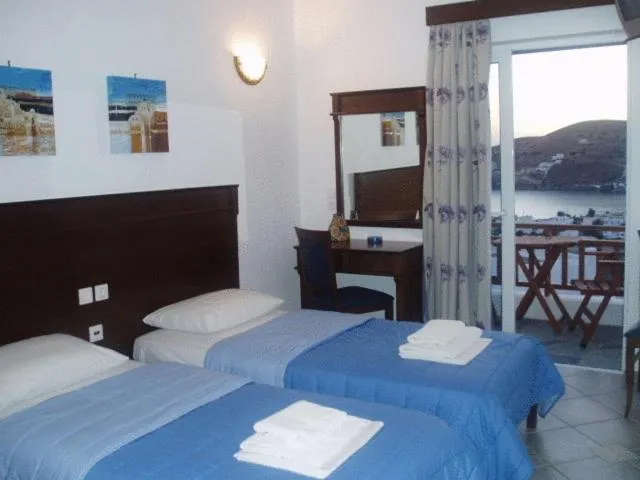 Bedroom in Rita's Place Hotel