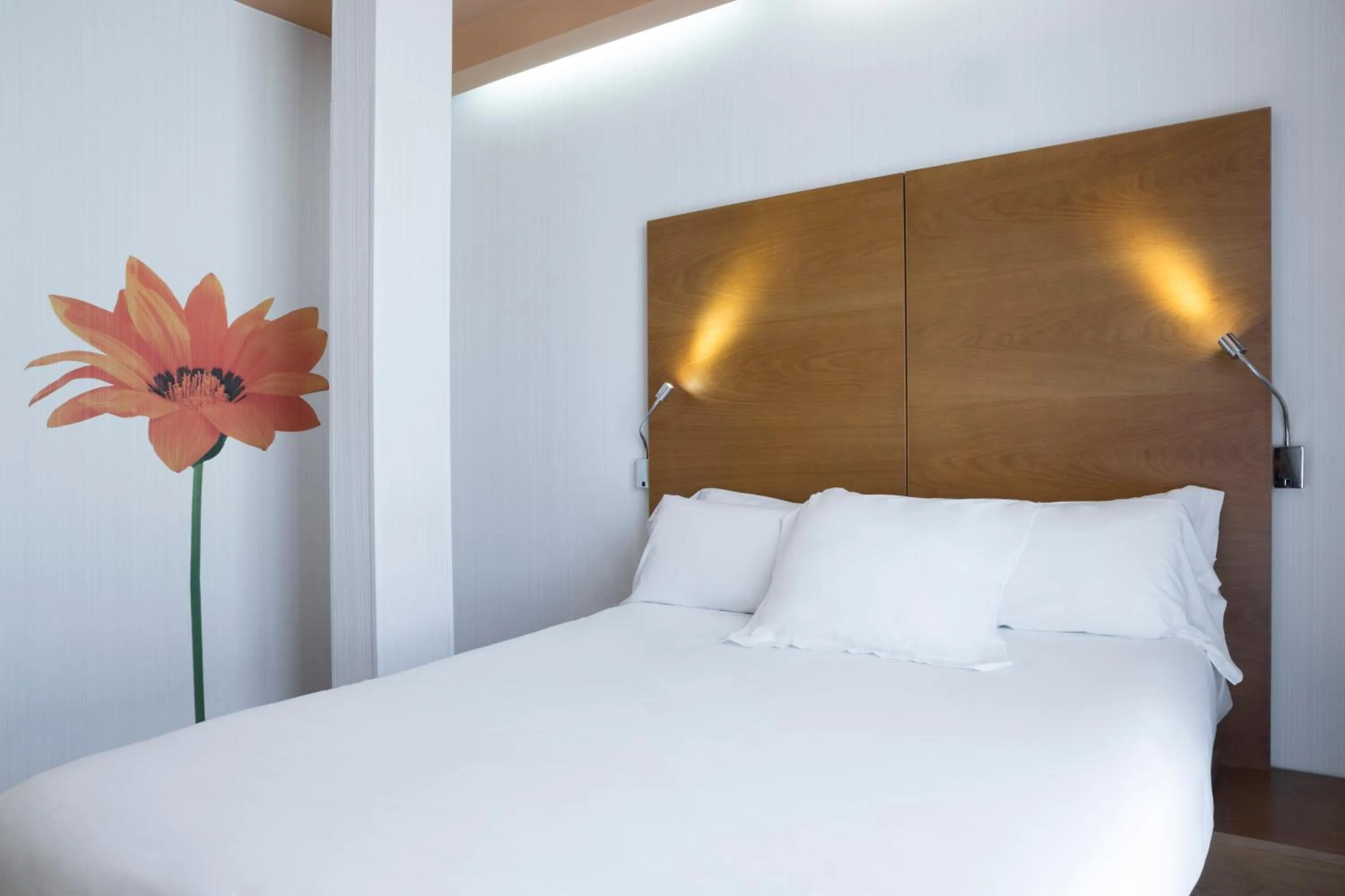 Bed in Petit Palace Plaza Málaga