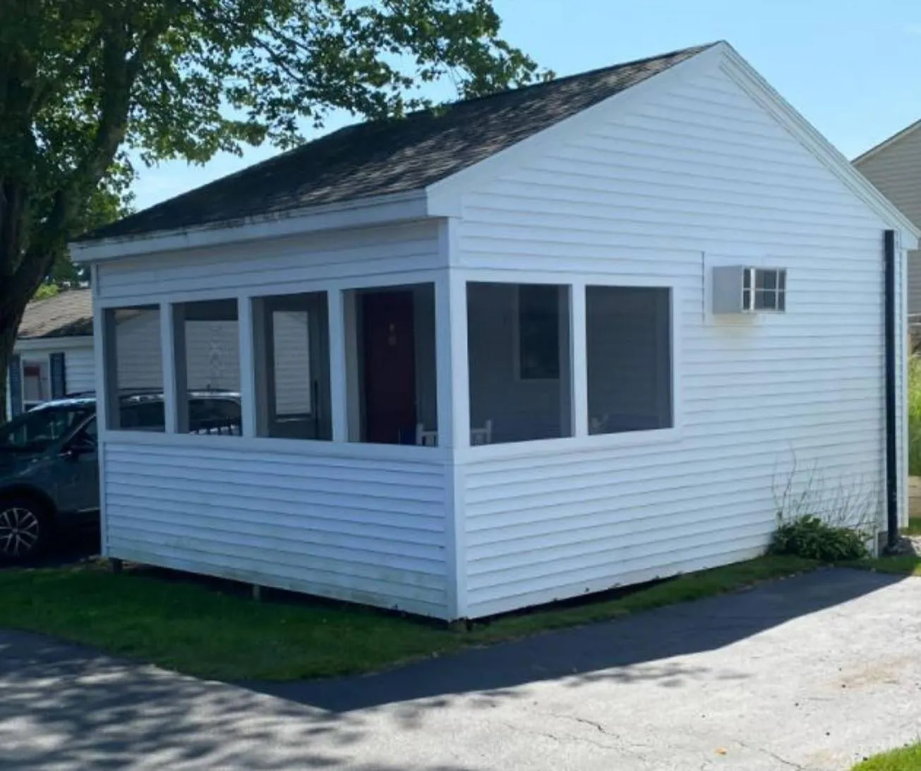 Property building in Carriage House Motel Cottages & Suites