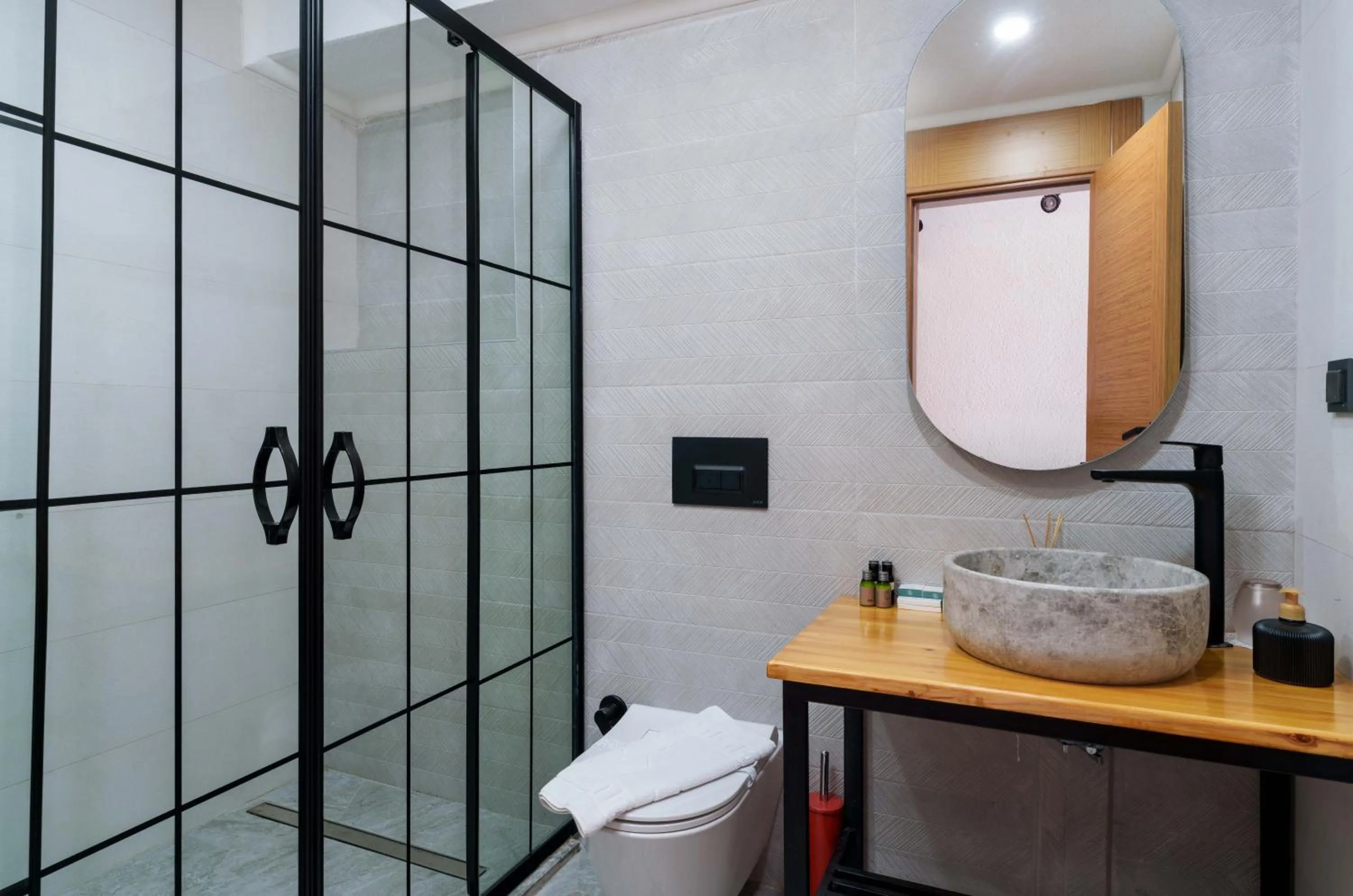 Bathroom in Lupia Suites