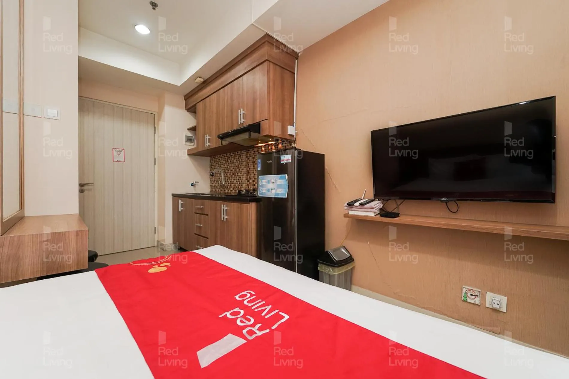 Bedroom in RedLiving Apartemen Grand Kamala Lagoon - Aoklah Property Tower Barclay North