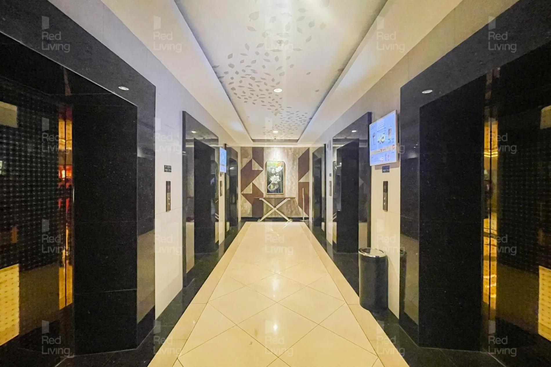 elevator in RedLiving Apartemen Grand Kamala Lagoon - Aoklah Property Tower Barclay North