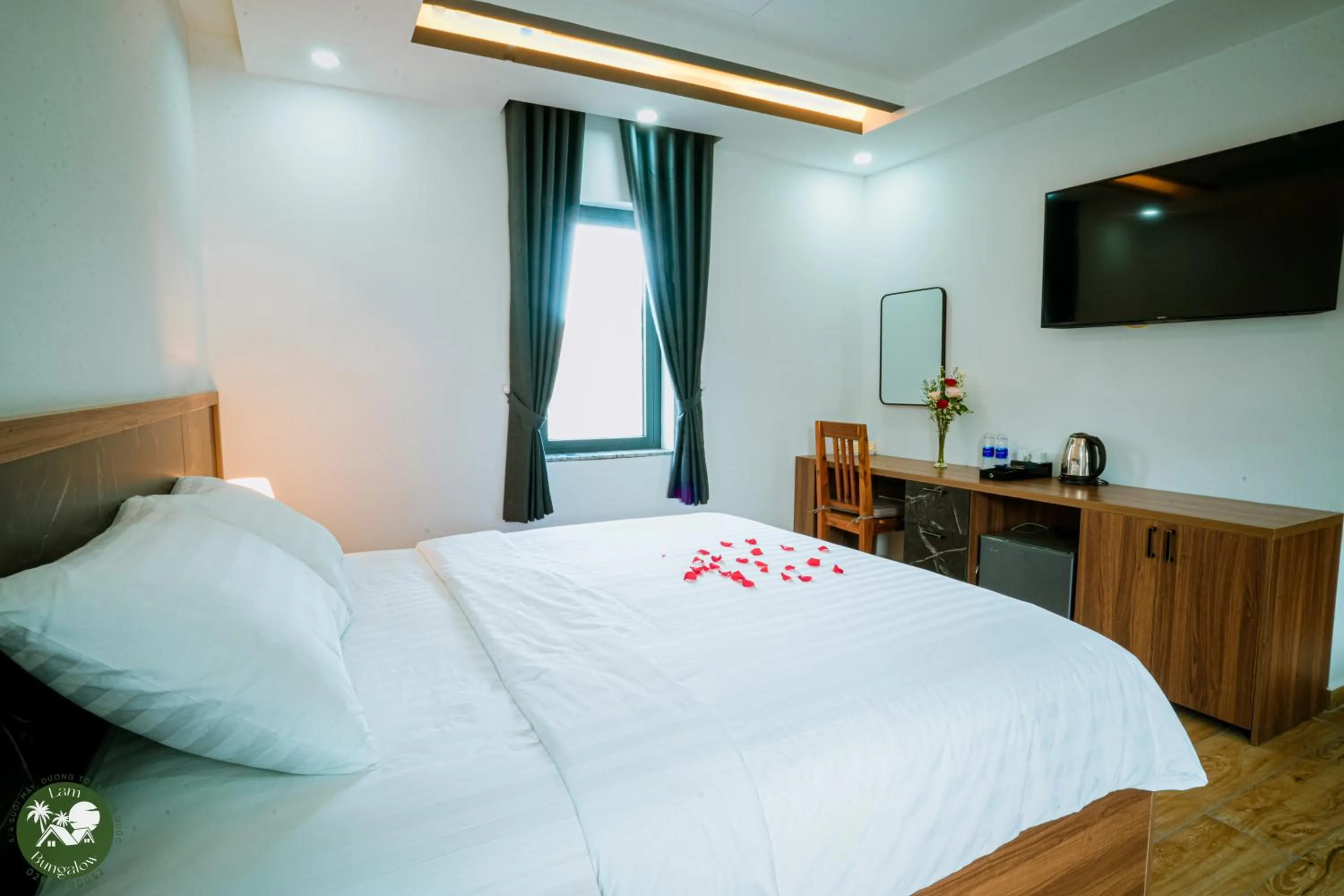 Bed in LAM BUNGALOW Resort & Spa