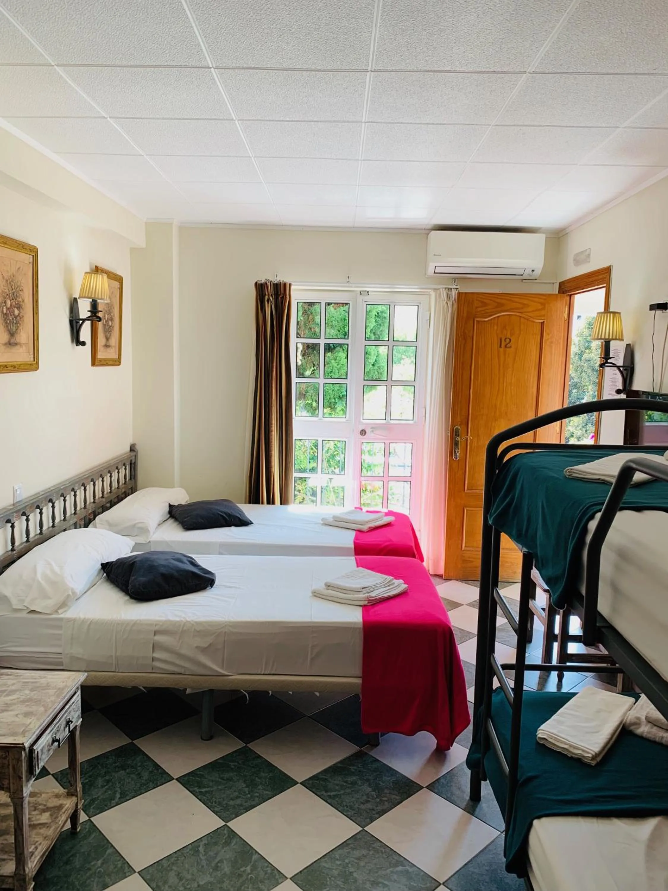 Bed in Pensión Aduar