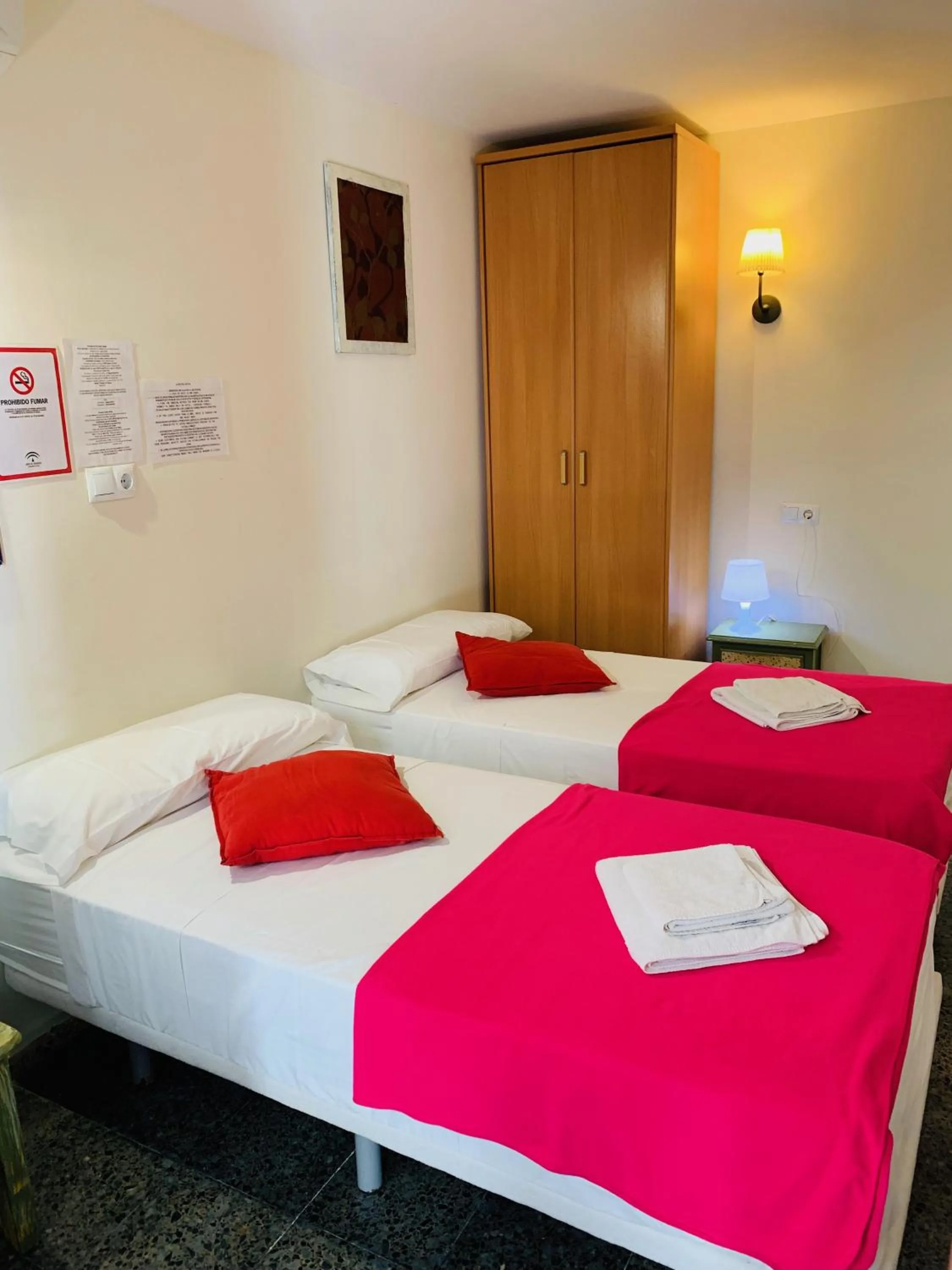 Bed in Pensión Aduar