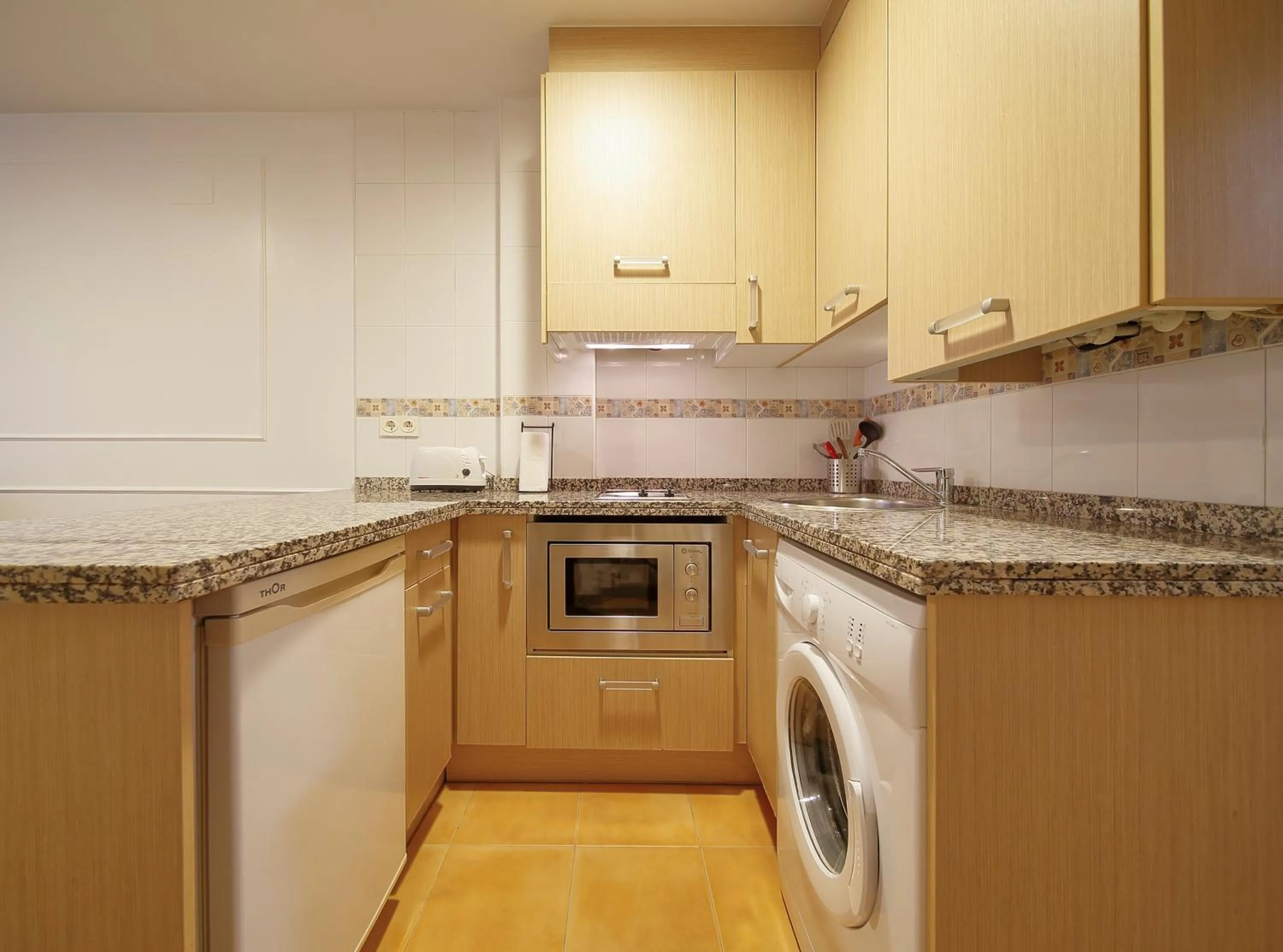 Kitchen or kitchenette in Apartamentos Urban Blue, Blue Hotels