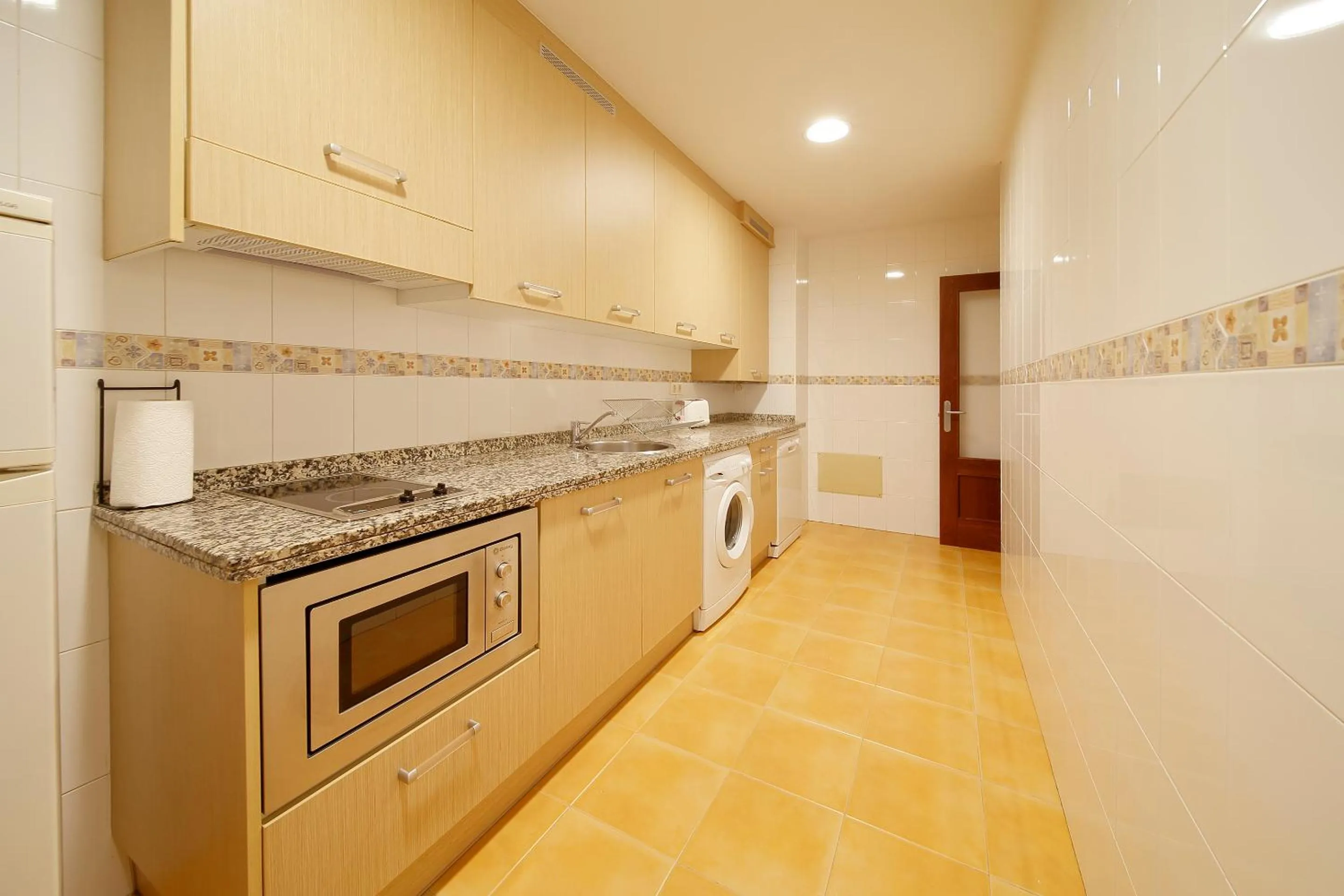 Kitchen or kitchenette in Apartamentos Urban Blue, Blue Hotels