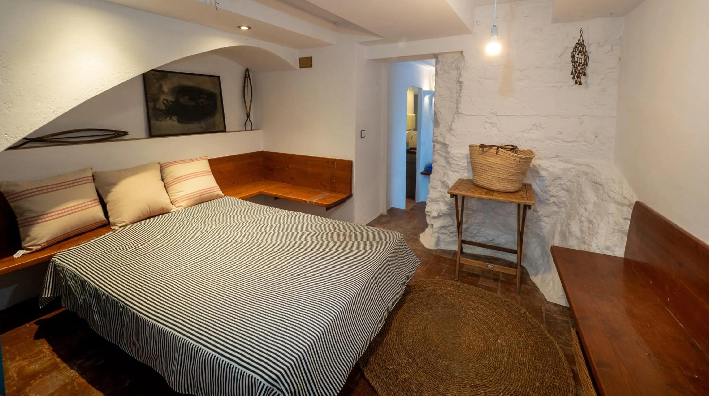 Bed in Flateli Sa Tuna Apartment