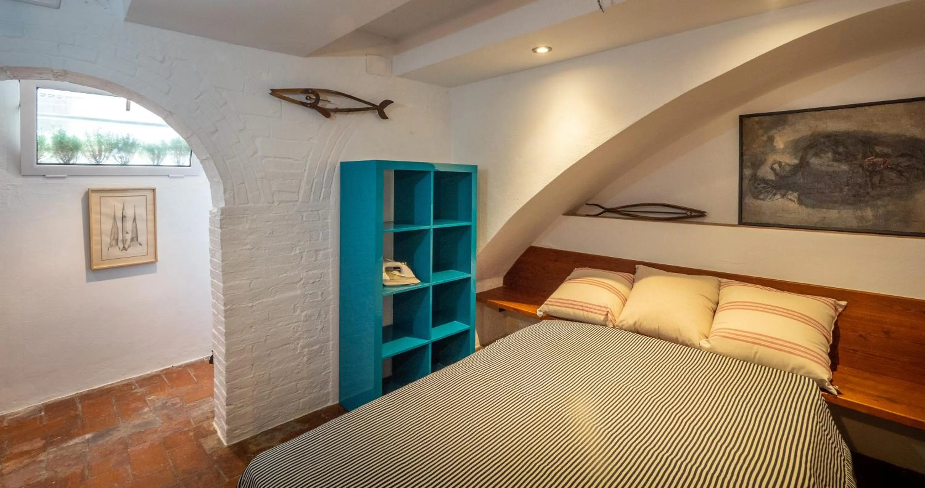 Bed in Flateli Sa Tuna Apartment